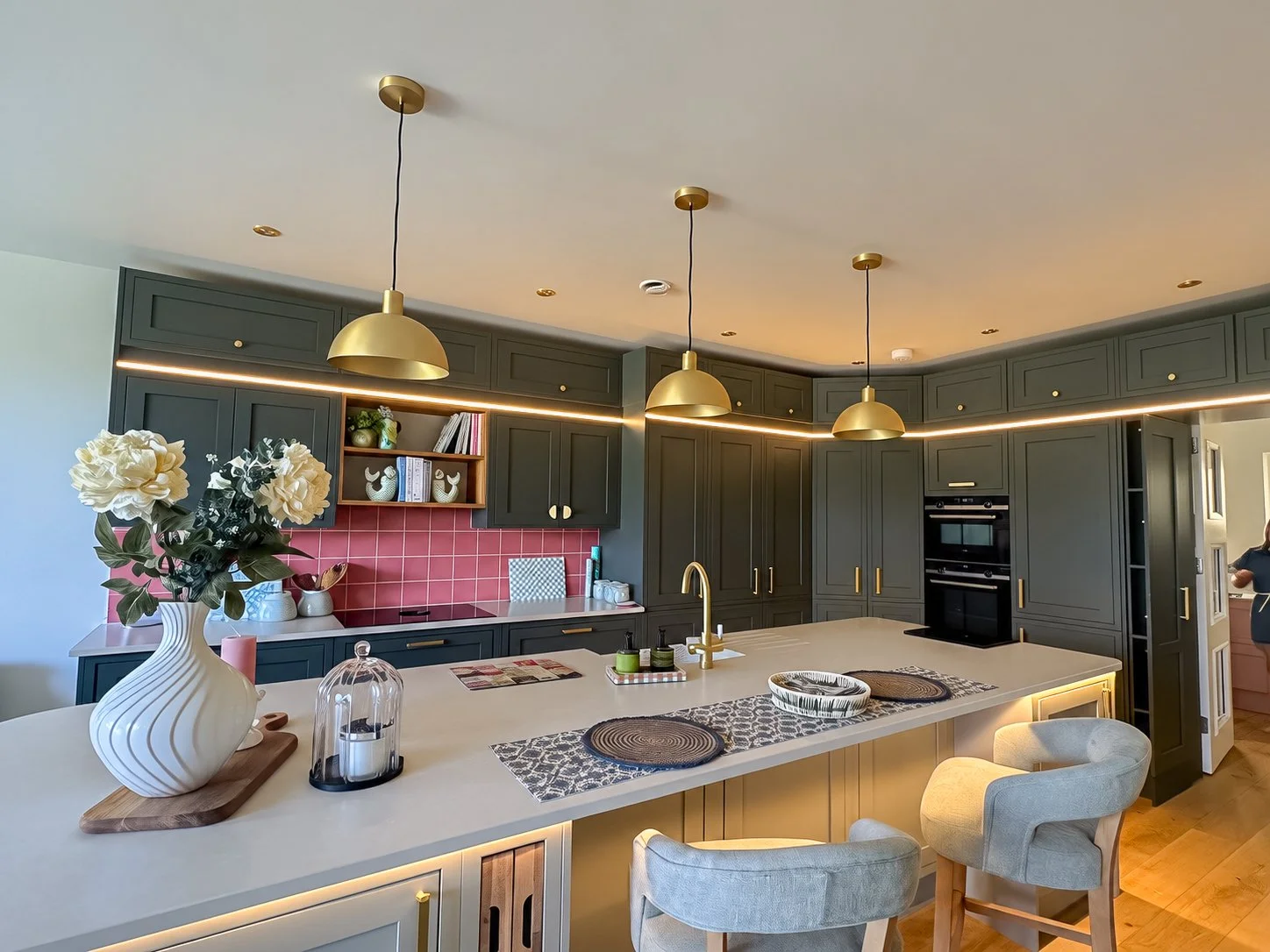 Elegant dining area in a Bath townhouse with Art Deco-inspired interiors and ambient lighting