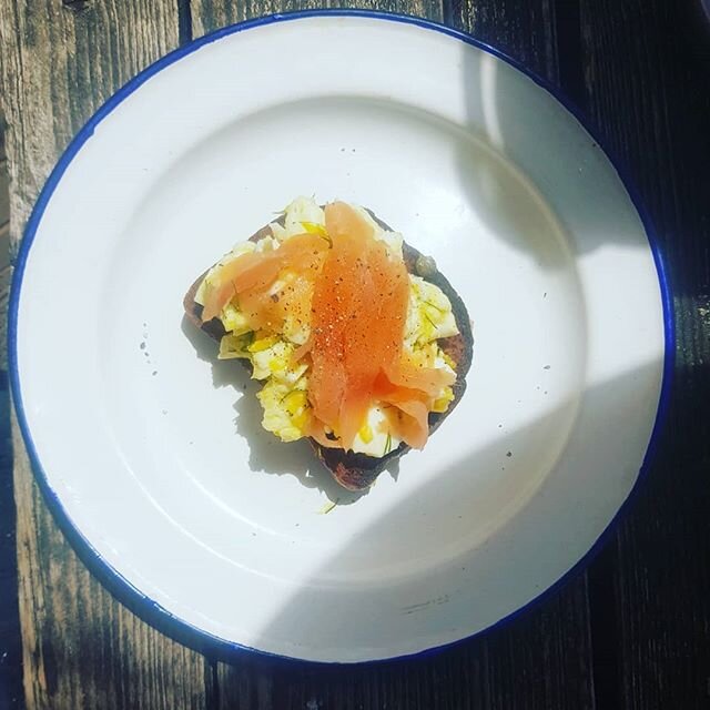 Semi-hard boiled biodynamic eggs @brambletyefruitfarm crushed with capers and dill @wild_country_organics_ with some nice smoked salmon on sourdough rye. Happy Sunday!