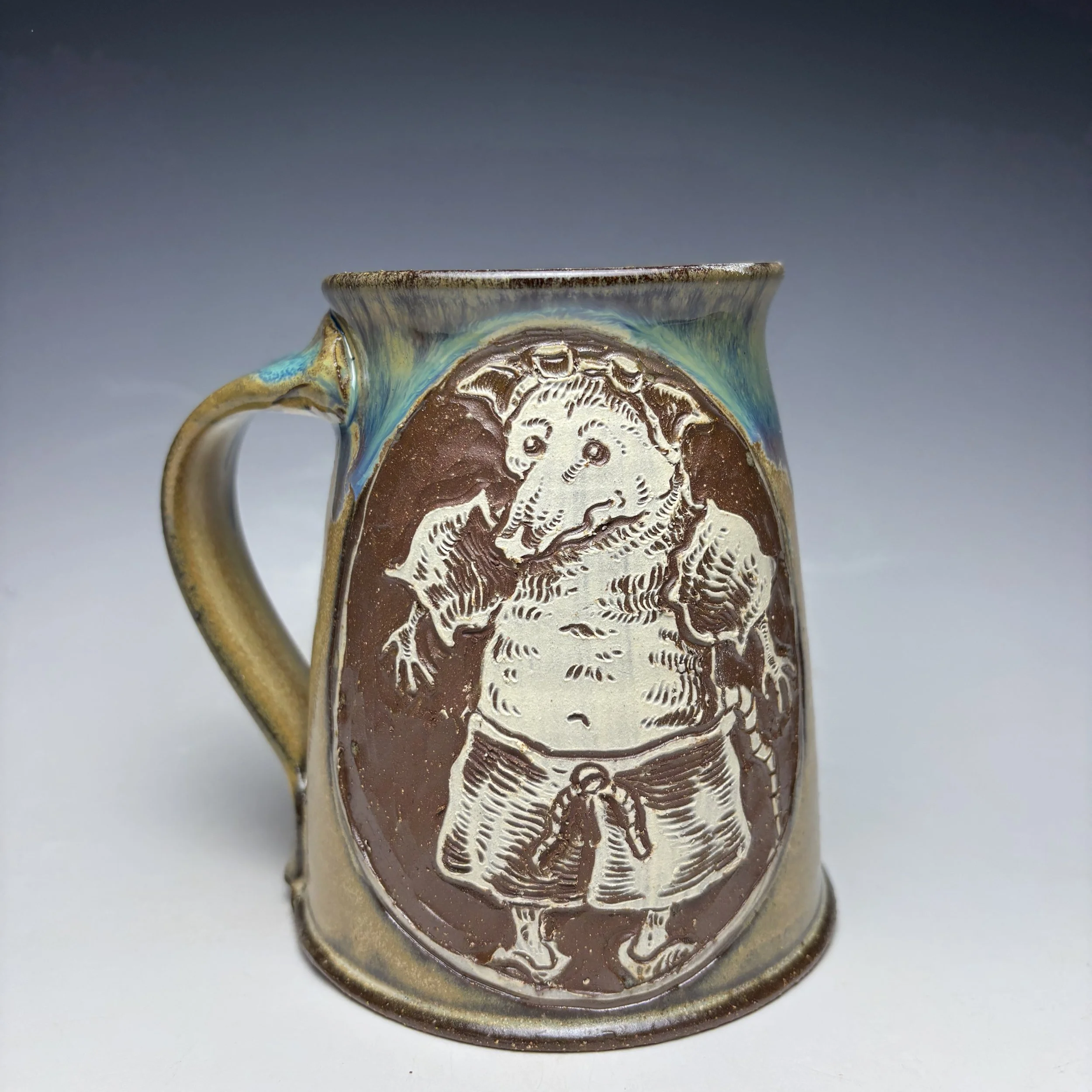 Hand Carved Buster Mug