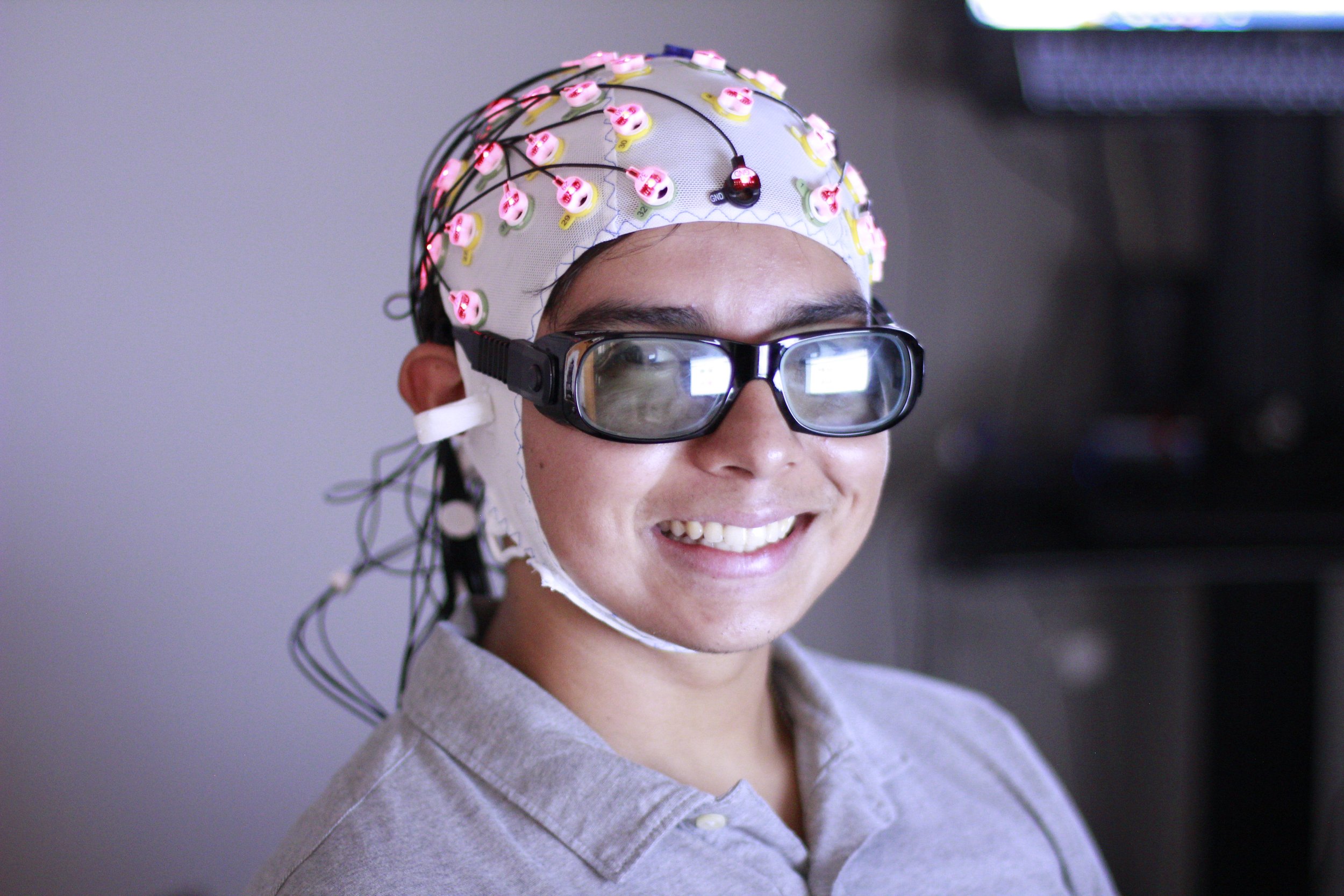 Patrick was wearing a 64 channel EEG cap, and it lights up like a Christmas tree.