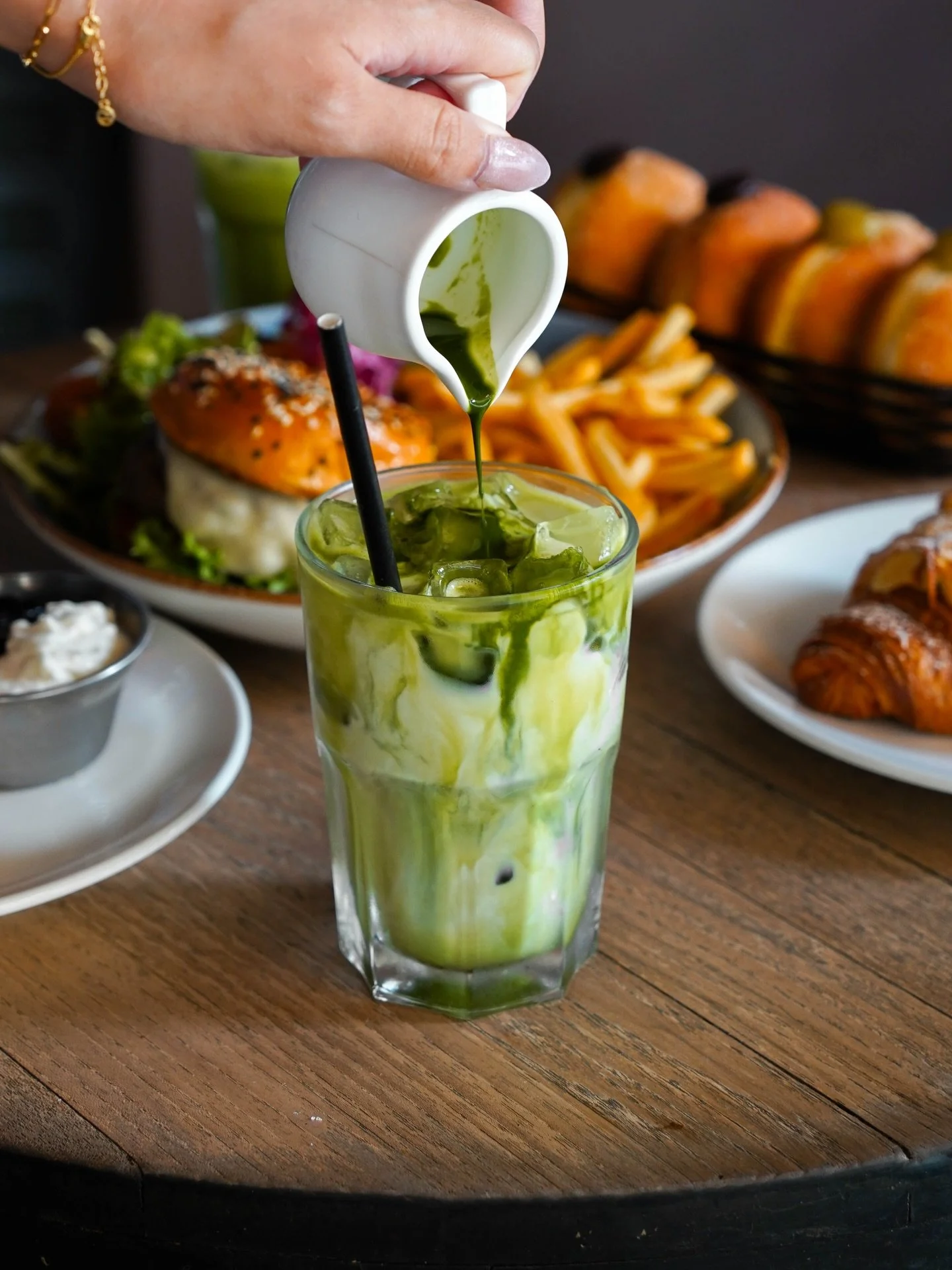 Iced matcha latte for warm Tuesdays and slow starts to the week.

Book a table at nassimhill.com.sg.