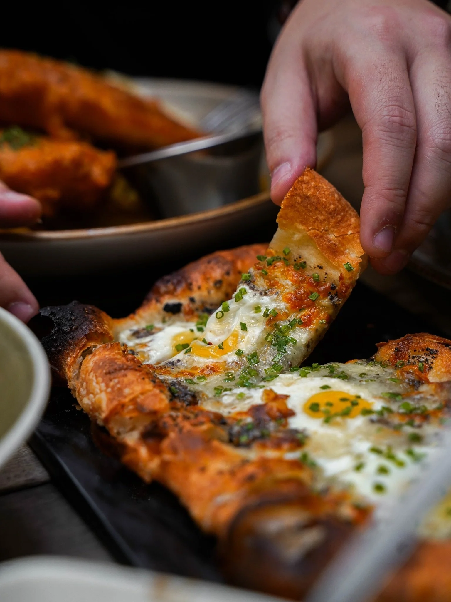 Crisp and chewy flatbread layered with truffle paste, topped with delicate quail eggs, a scattering of fresh chives, and finished with truffle oil and a touch of truffle salt.

Rich, aromatic, and the kind of dish that lingers a little longer.

Make 