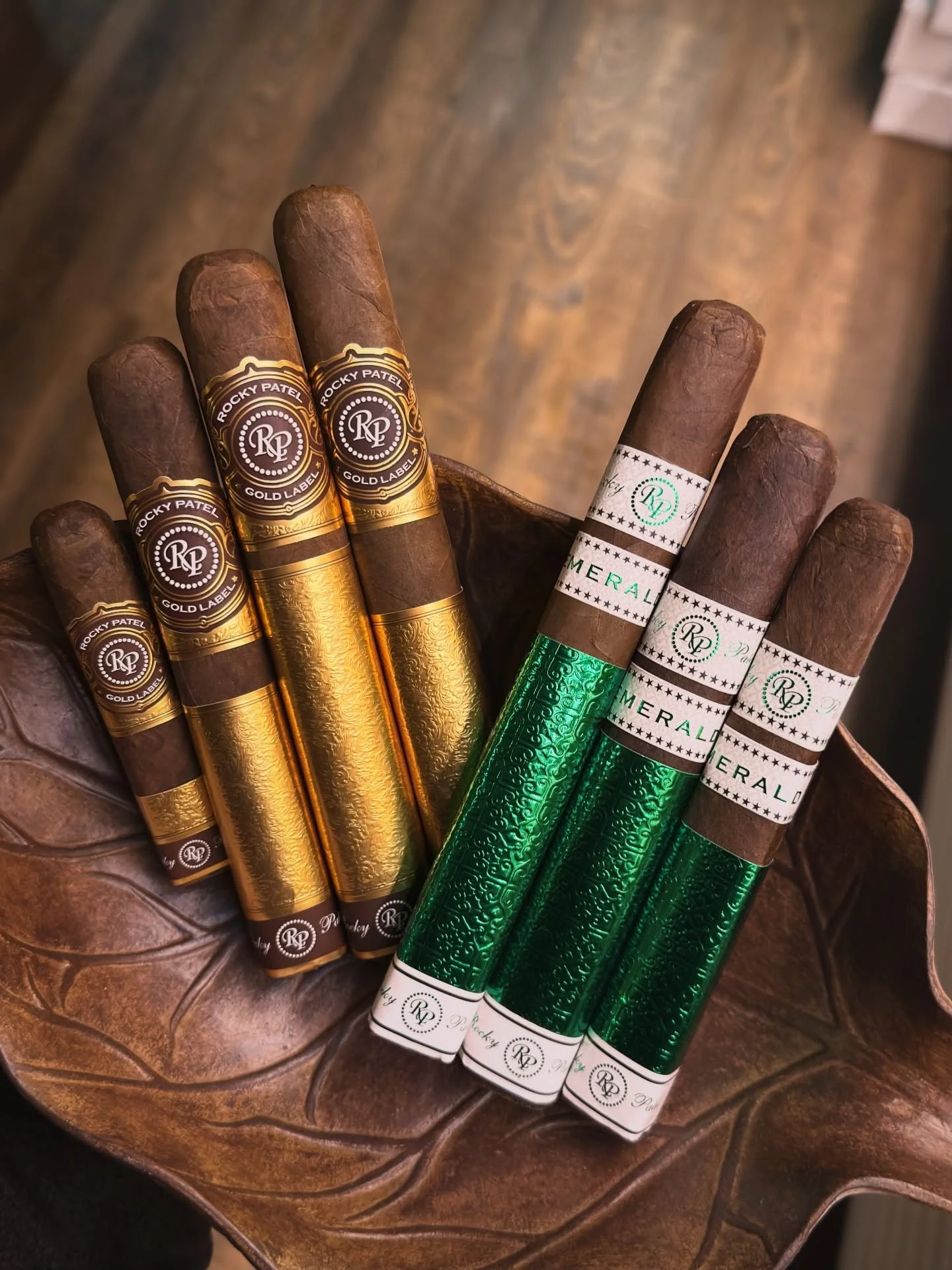 Now Smoking: @rockypatelcigar 

Rocky Patel Emerald &ndash;
Strength: Medium
Notes: Cedar, pepper, earth, cream
Vitola: Robusto, Toro, Sixty

Rocky Patel Gold Label &ndash;
Strength: Medium - Full
Notes: Leather, earth, baking spice, pepper
Vitola: H
