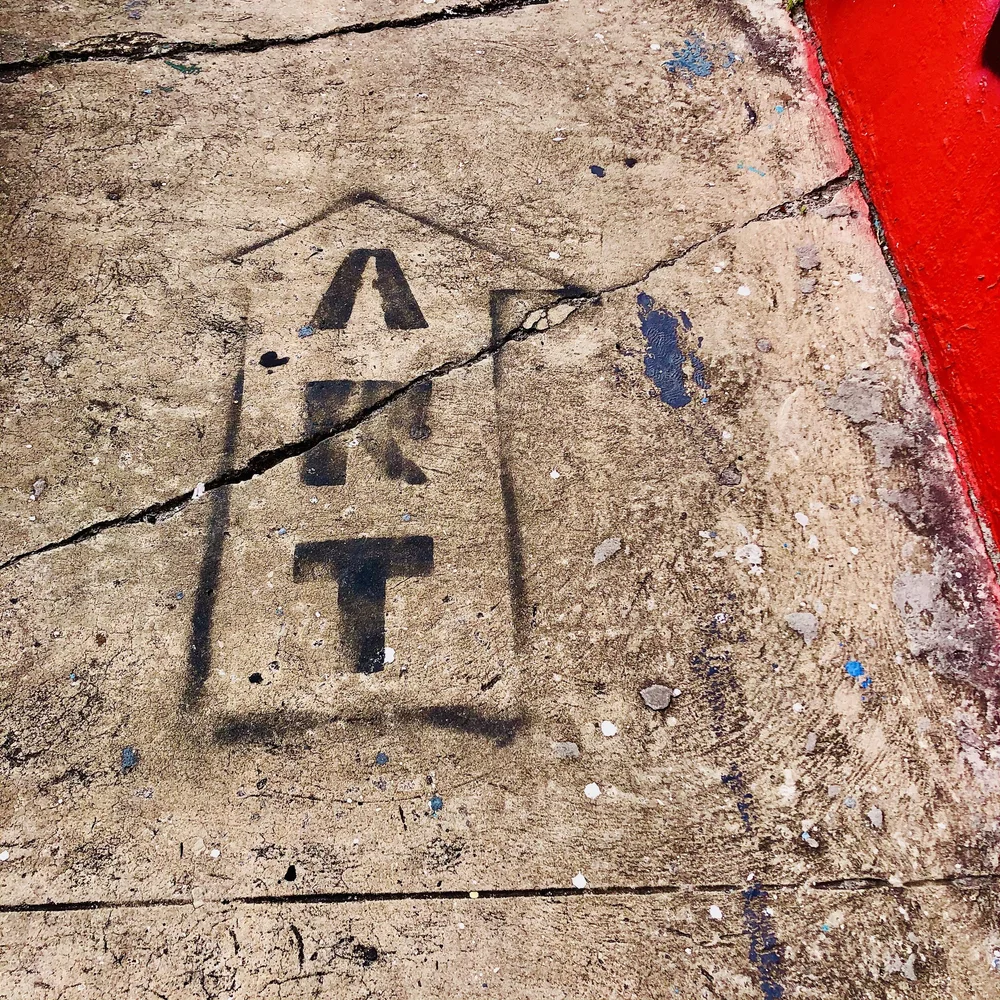 Stenciled ART on Sidewalk.jpeg