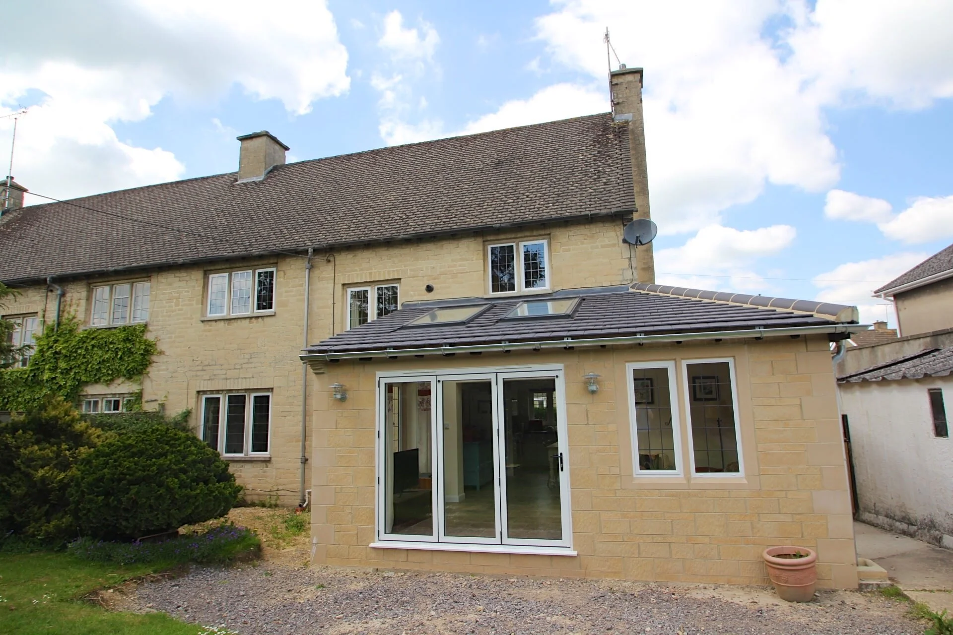 Wrap-around house extension design and planning