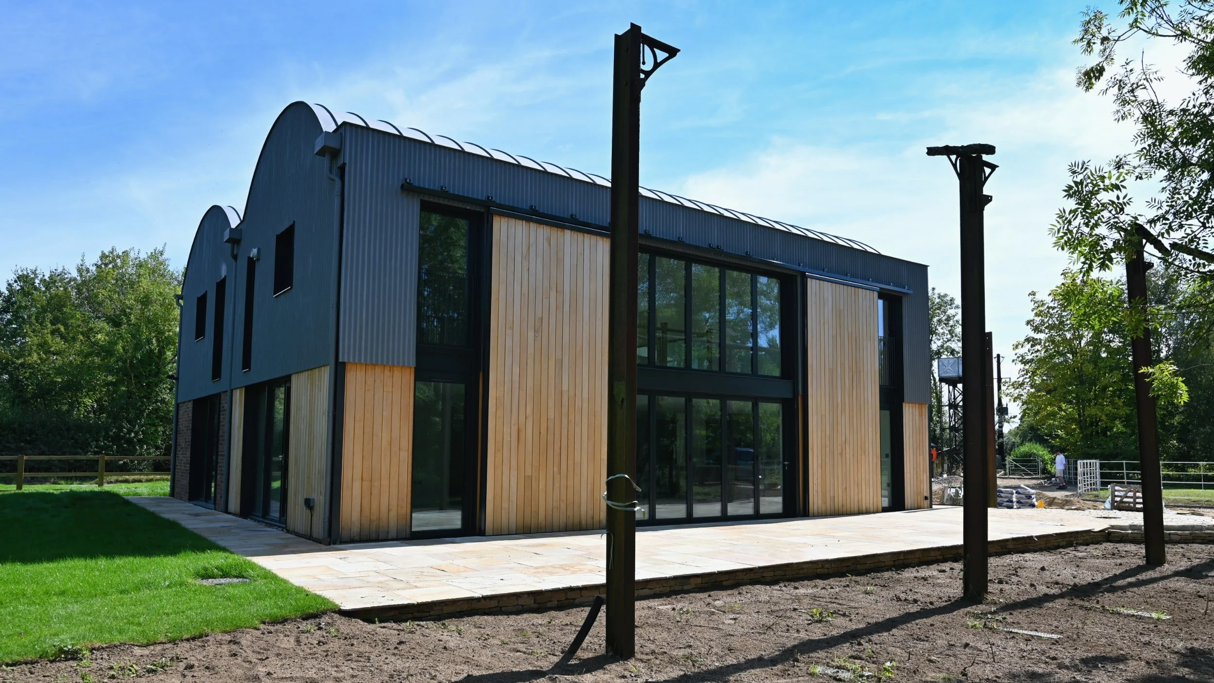 Dutch barn conversion and new build