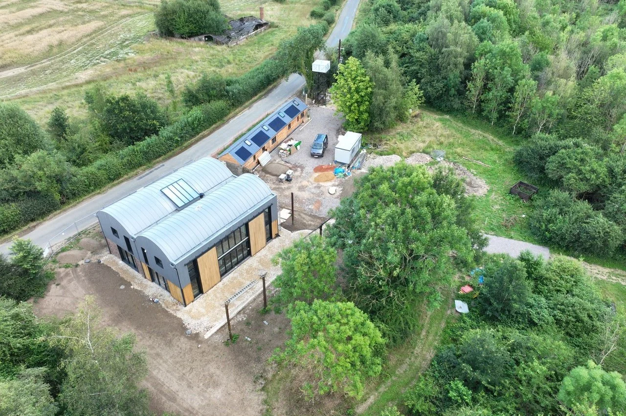 Dutch barn conversion and new build