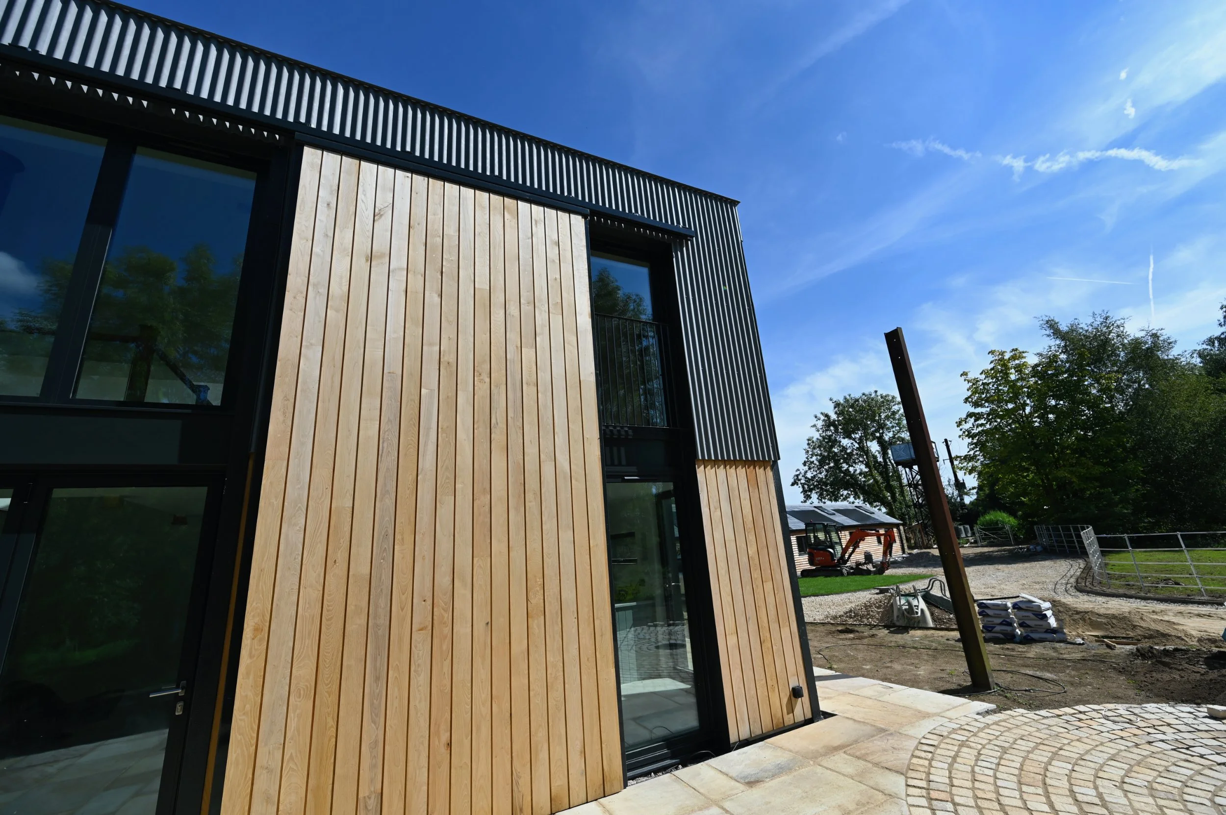 Dutch barn conversion and new build