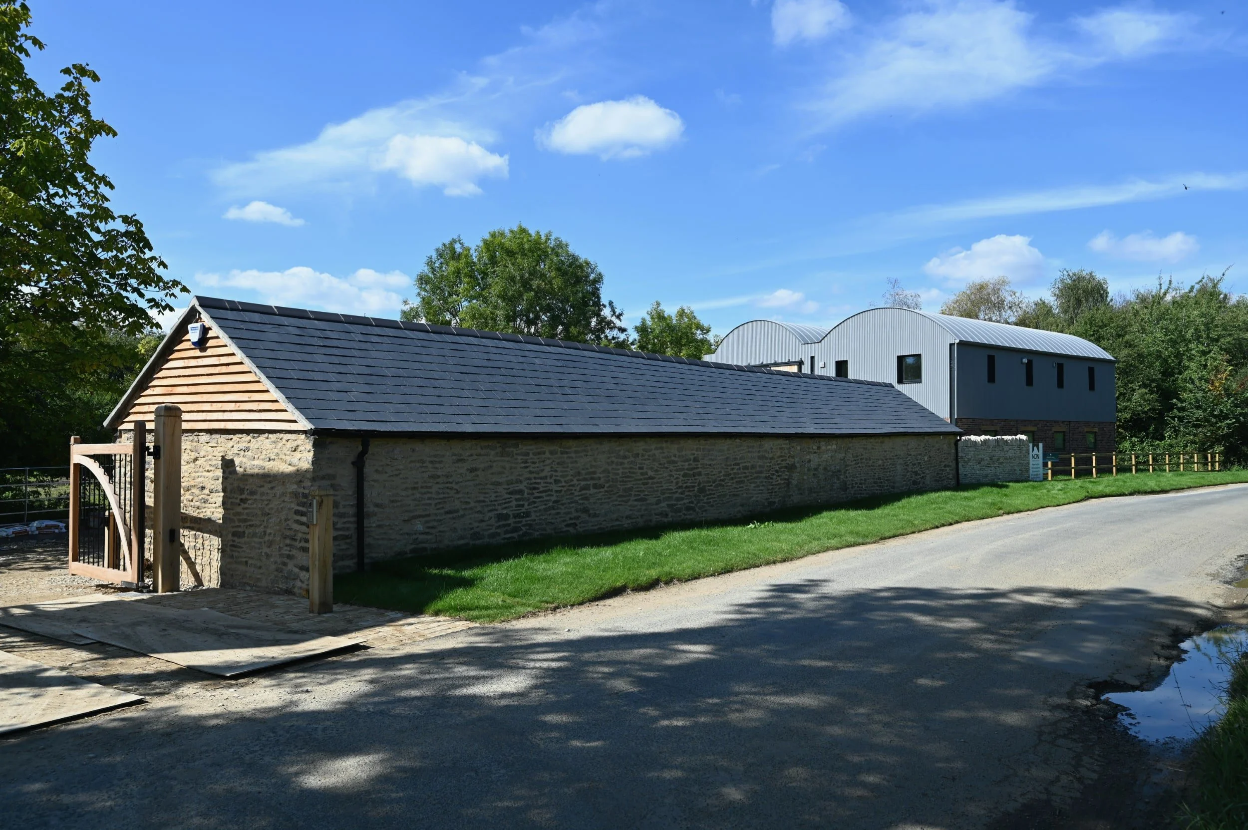 Dutch barn conversion and new build