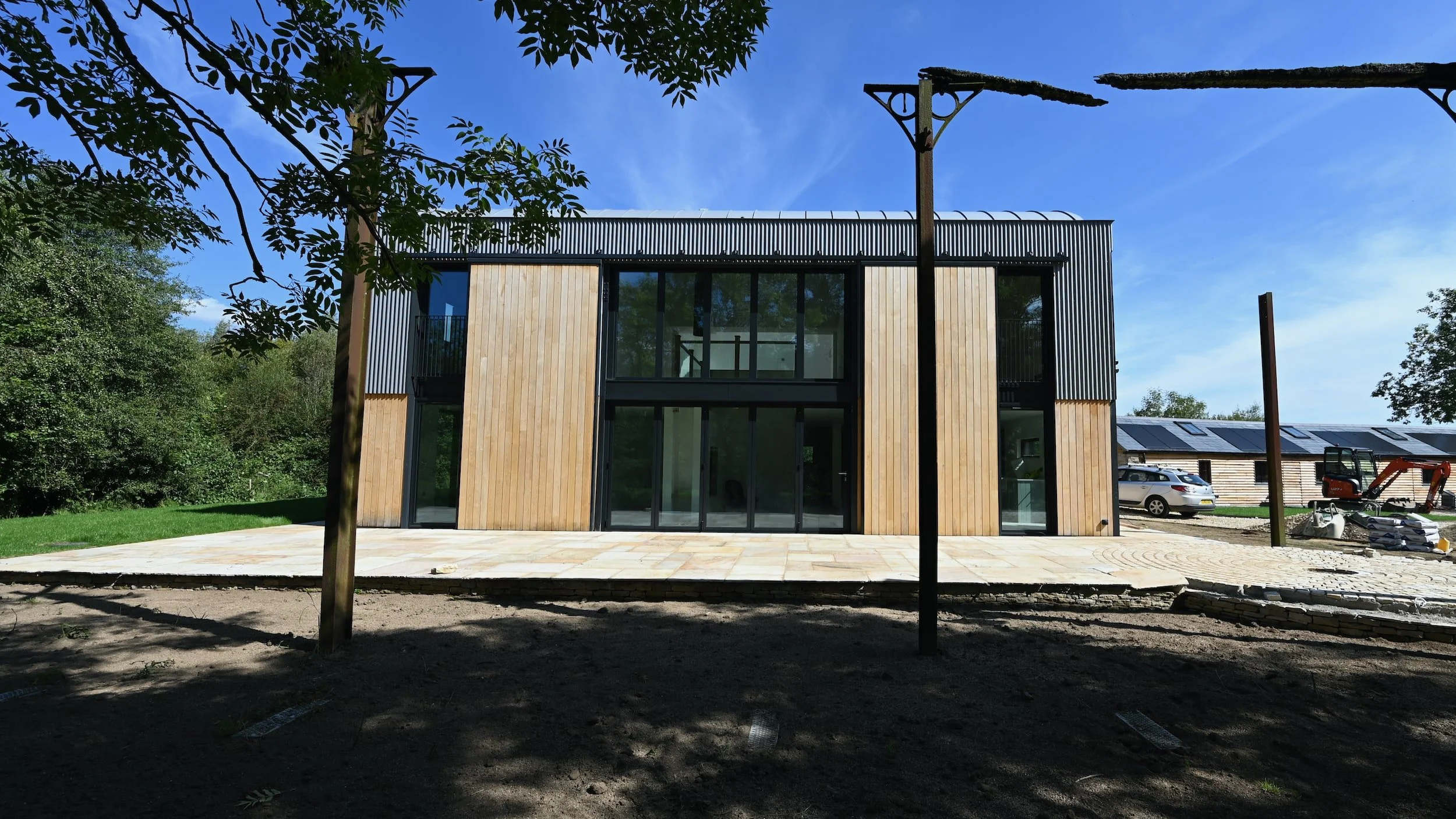 Dutch barn conversion and new build