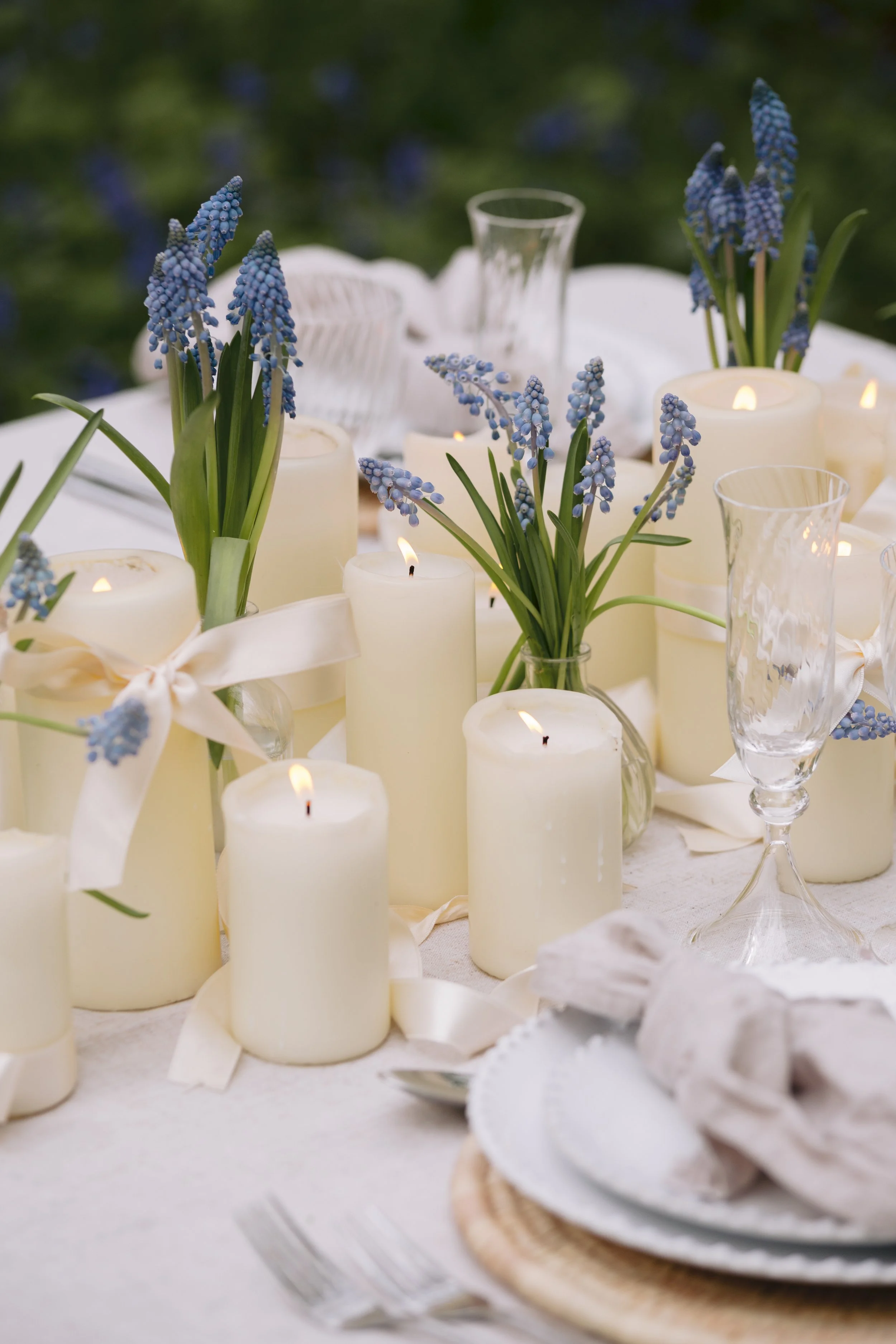 Wedding floristry in London and West Sussex, showcasing ceremony arrangements and table flowers designed to complement modern venues.