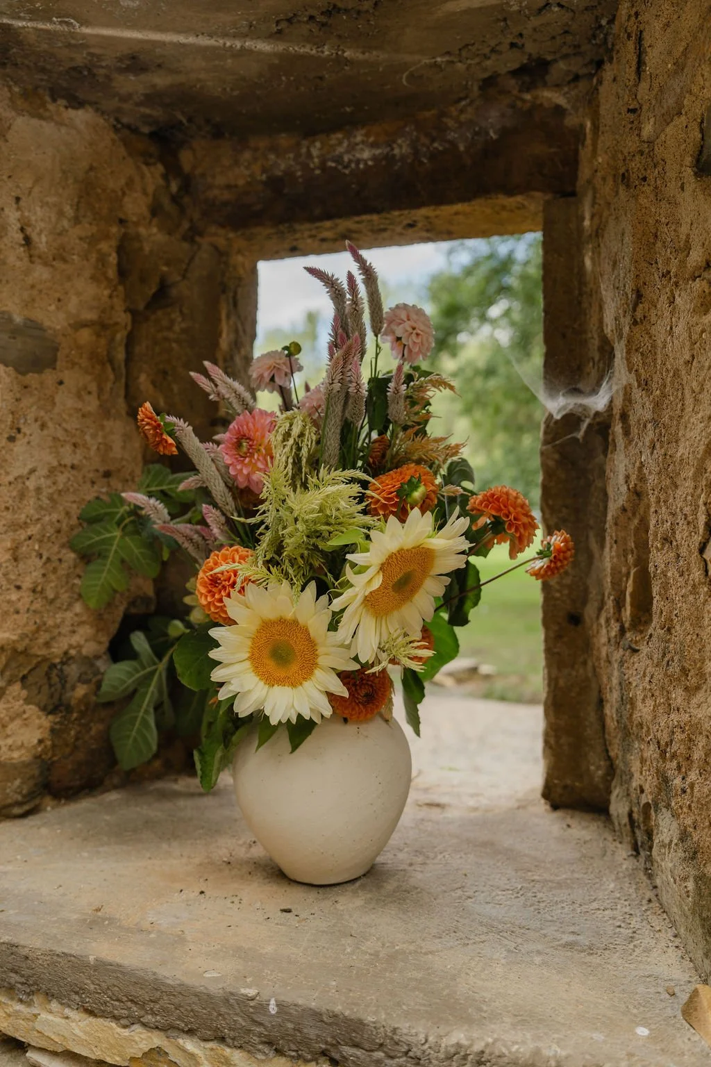 Seasonal wedding floristry in London and West Sussex, featuring elegant bridal bouquets and refined floral arrangements designed for modern, design-led weddings.