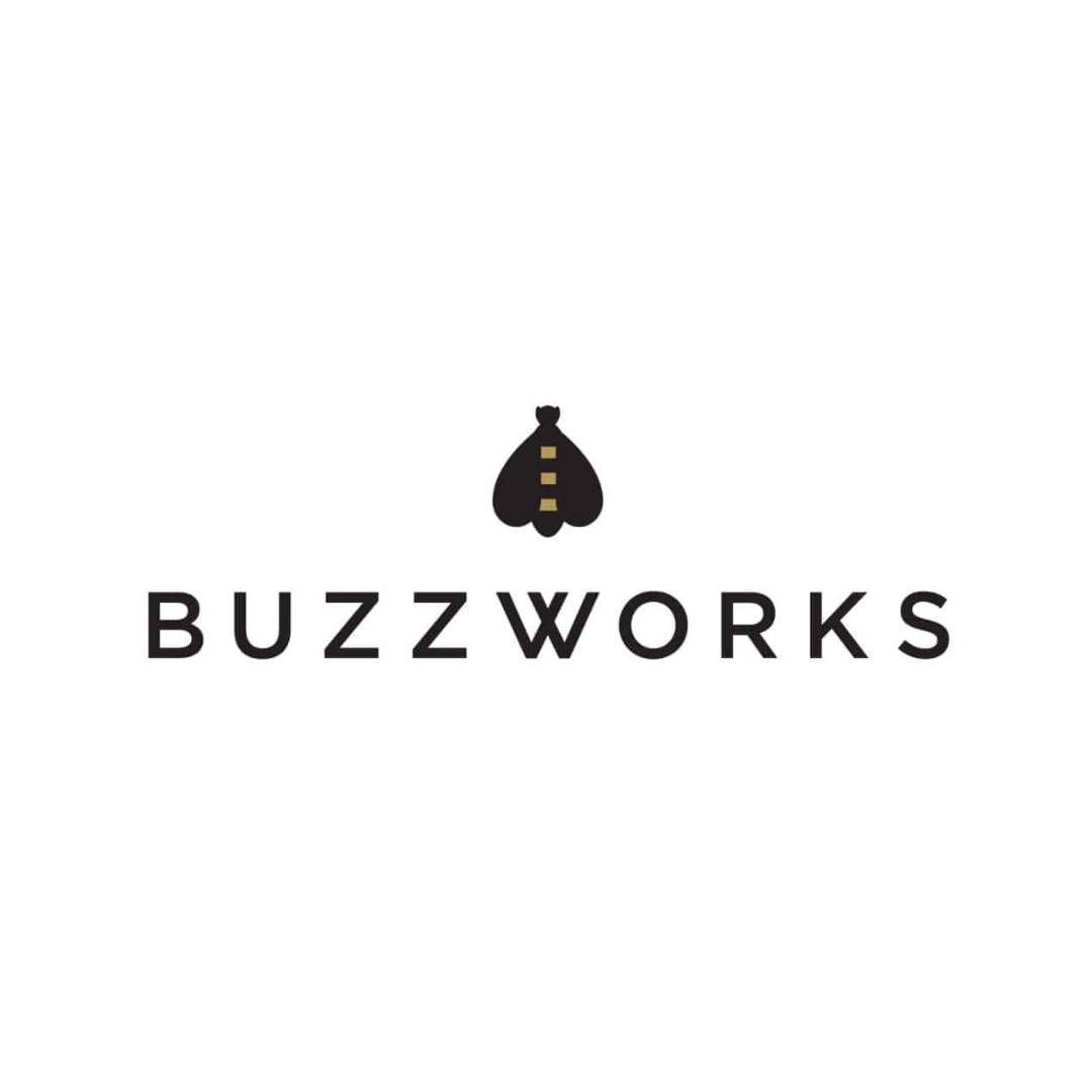 Logo for Buzzworks featuring a black bee with yellow stripes above the company name in black capital letters