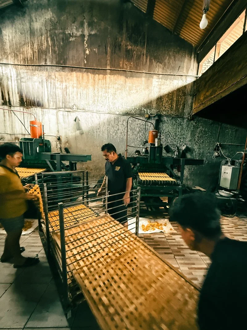   Cycling straight to the krupuk factory  