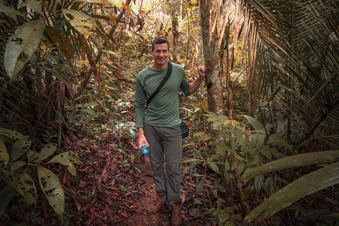  This boy is happy because he just ate larvae pulled straight from a tree  