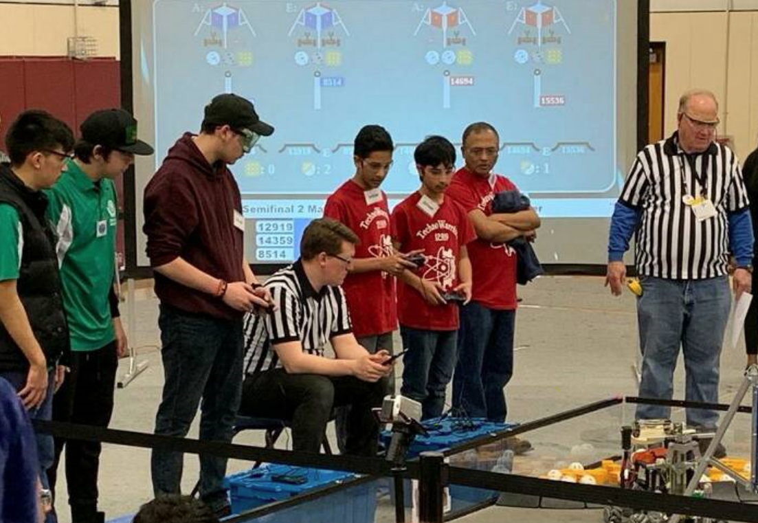 Robot match for engineering students that was a performance assessment in their class