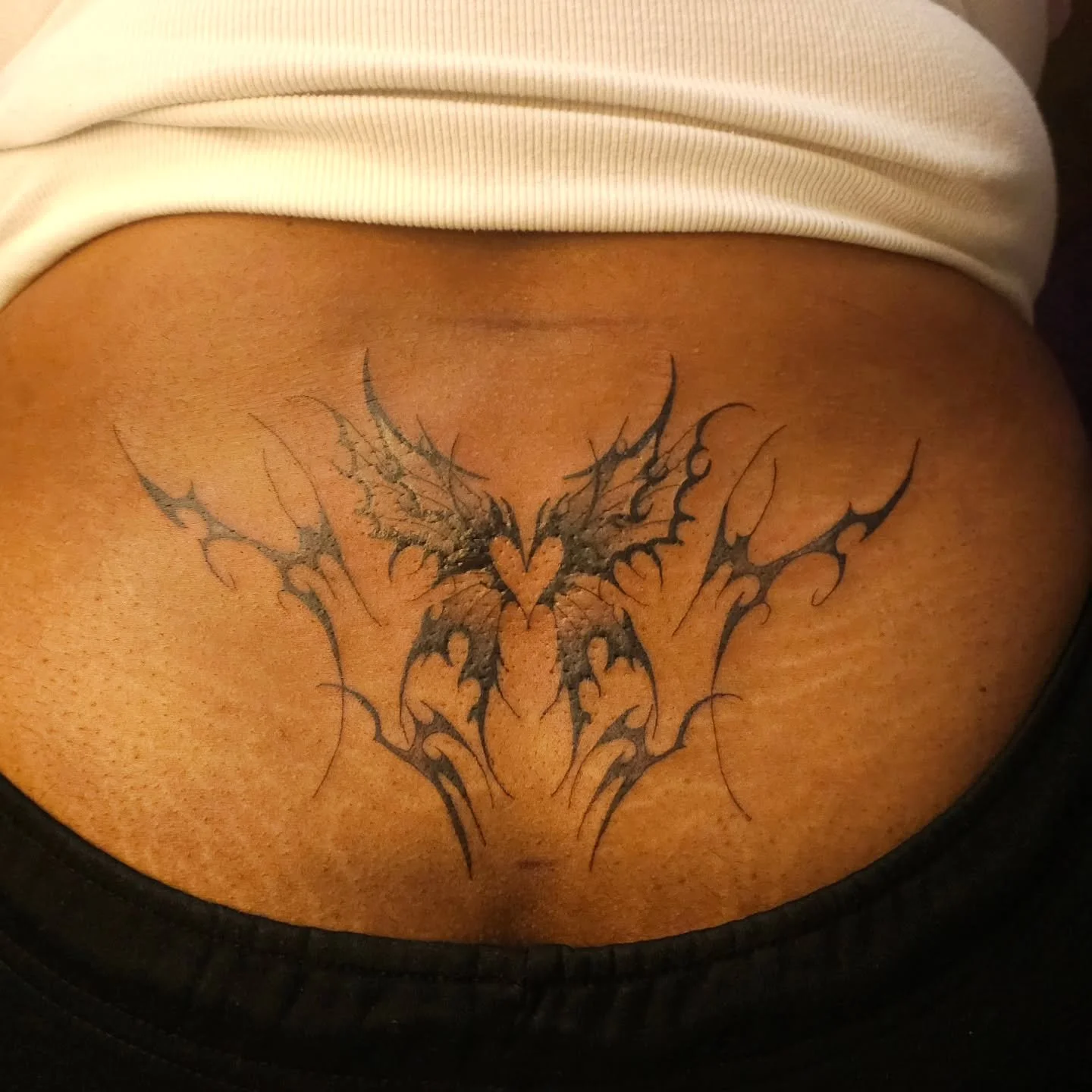 Beautiful butterfly lower back tattoo. Butterfly's spiritual meanings of a butterfly is transformation. Butterflies undergo a remarkable metamorphosis, evolving from a caterpillar into a chrysalis and finally emerging as a beautiful butterfly. This p