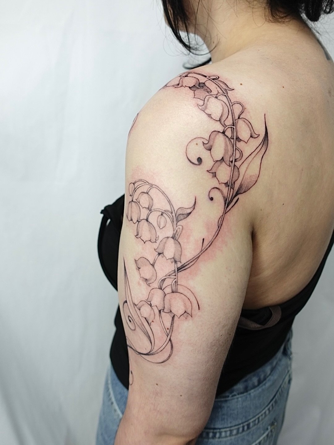 Lily of the valley floral wrap for my client J. Thank you for your trust and sitting so well.
.
I&rsquo;m booking for August - September. Fill out inquiry form to book.
.
#FinelinetattooartistMississauga
#WatercolortattooToronto
#FemaletattooartistMi
