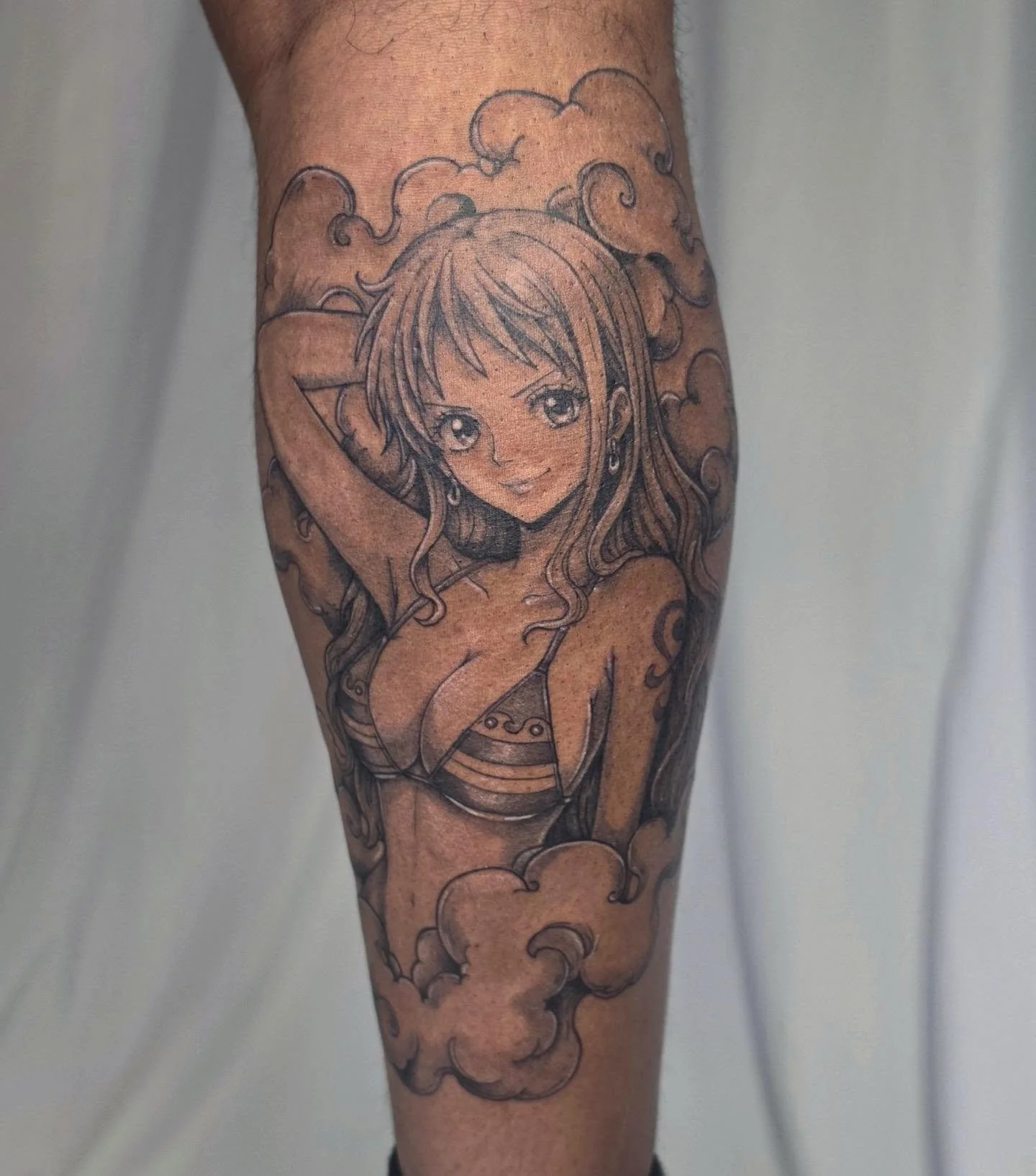 little Nami for the One Piece lovers. 🍊🧡
Loved working on this piece and bringing Nami to life in a softer, more feminine tattoo style while keeping those classic One Piece details. The clouds and flowing composition really helped tie everything to