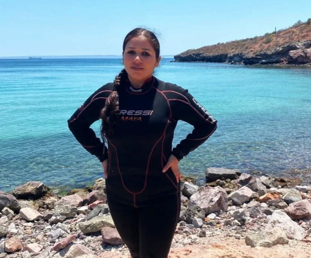 Vanessa Lucero standing in front of the sea