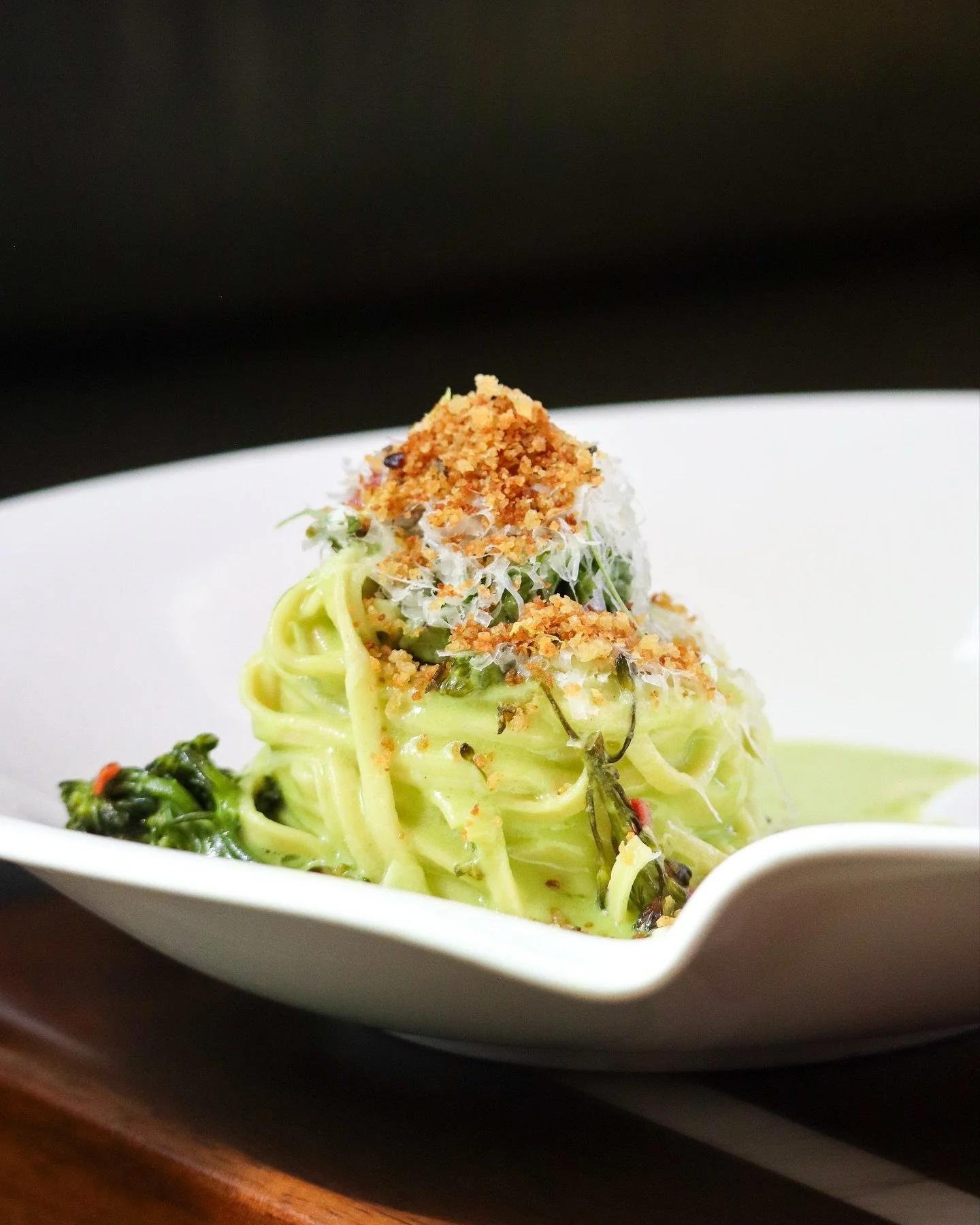Inspired by Bari&rsquo;s orecchiette con cime di rapa, our hand-cut Spaghetti alla Chitarra finds depth in roasted broccolini pesto, heat from Calabrian chili, and the salty clarity of pecorino Romano.
&nbsp;
Each forkful balances earth and fire &mda