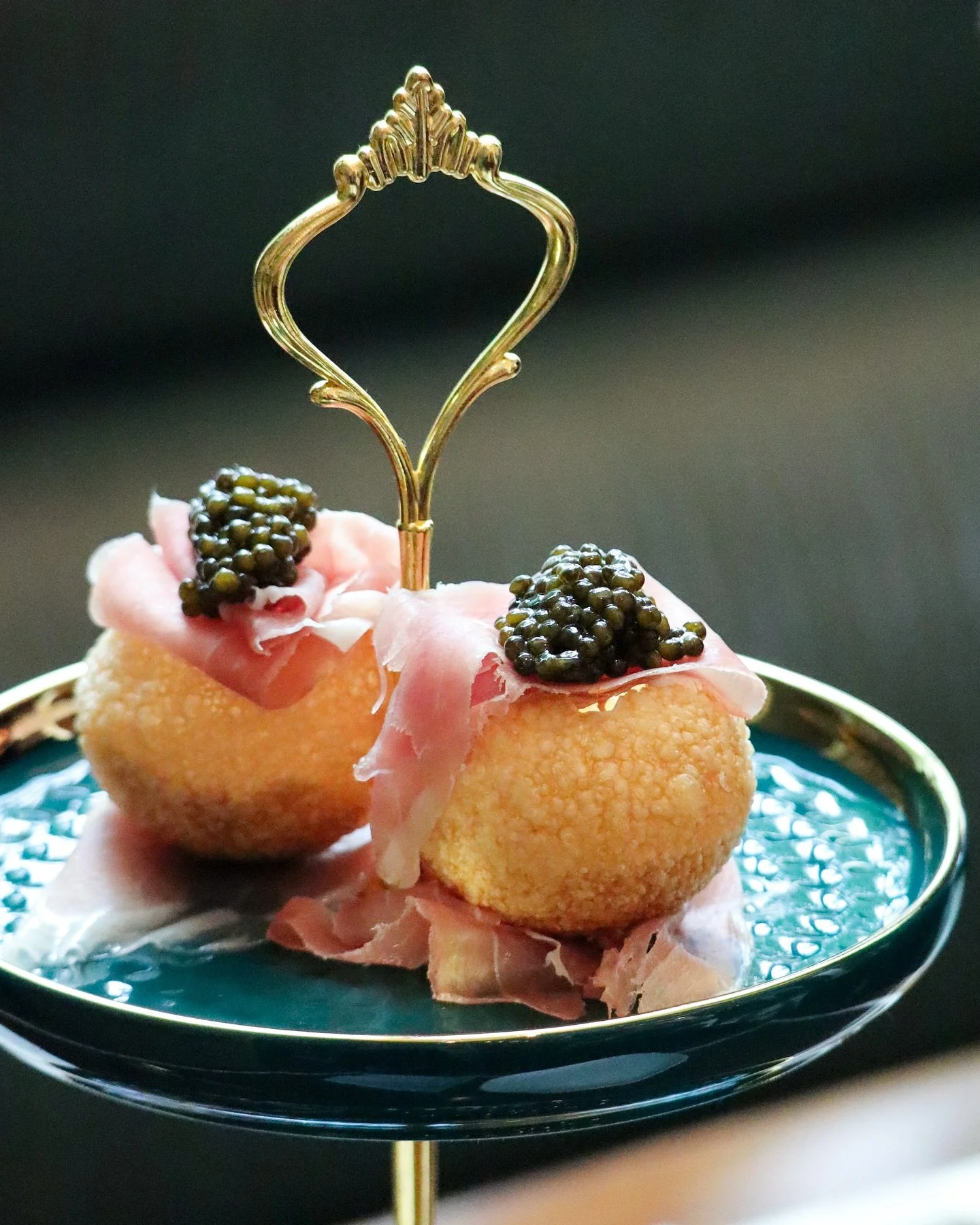 Begin your Yolan experience with a collection of refined bites &mdash; sumptuous, playful, and precise.

The Stuzzi Tower invites you into the rhythm of the Italian table: Castelvetrano olives filled with gorgonzola dolce, Duck Rag&ugrave; Arancini, 