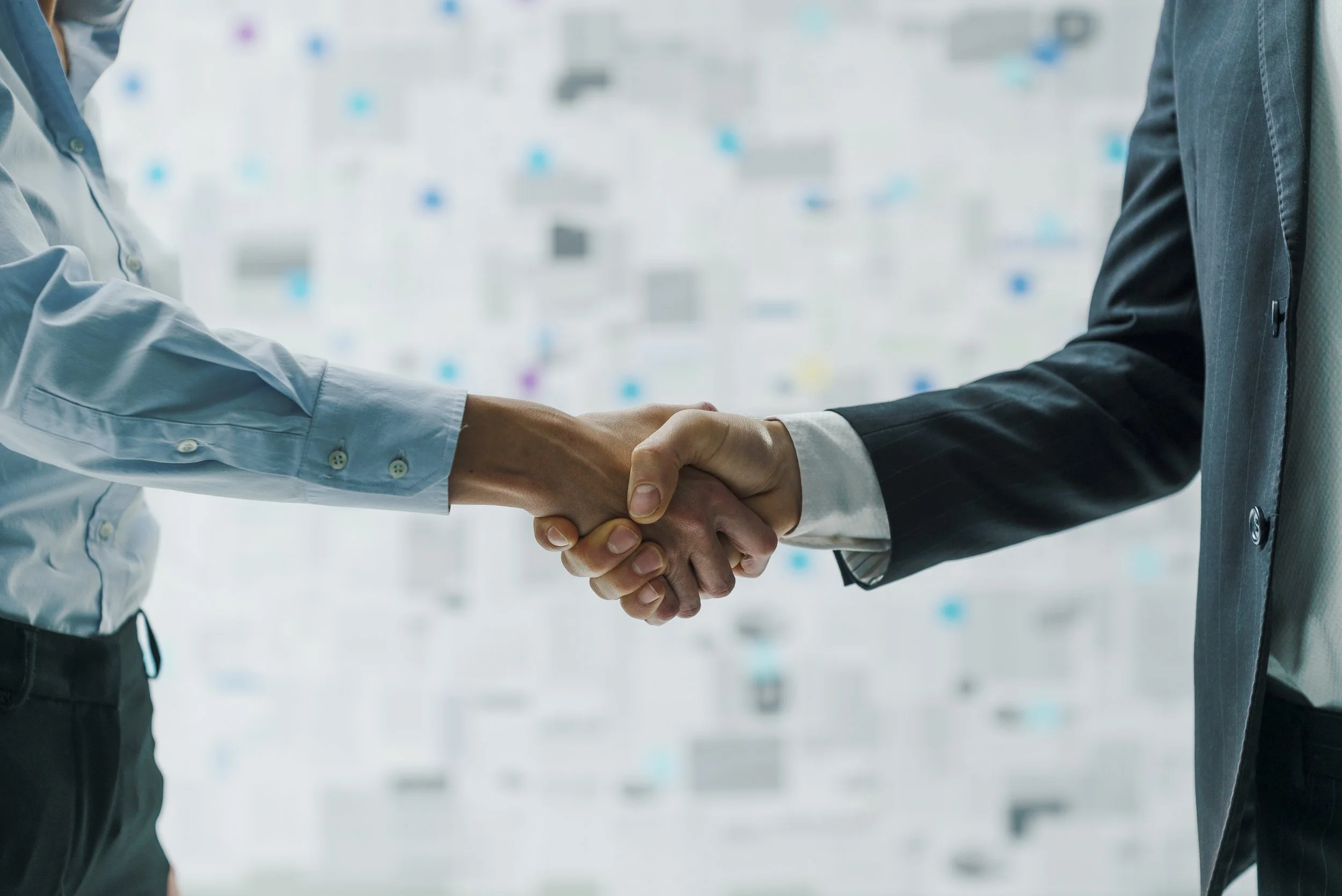 business-partners-shaking-hands-2021-08-30-02-12-08-utc.jpg