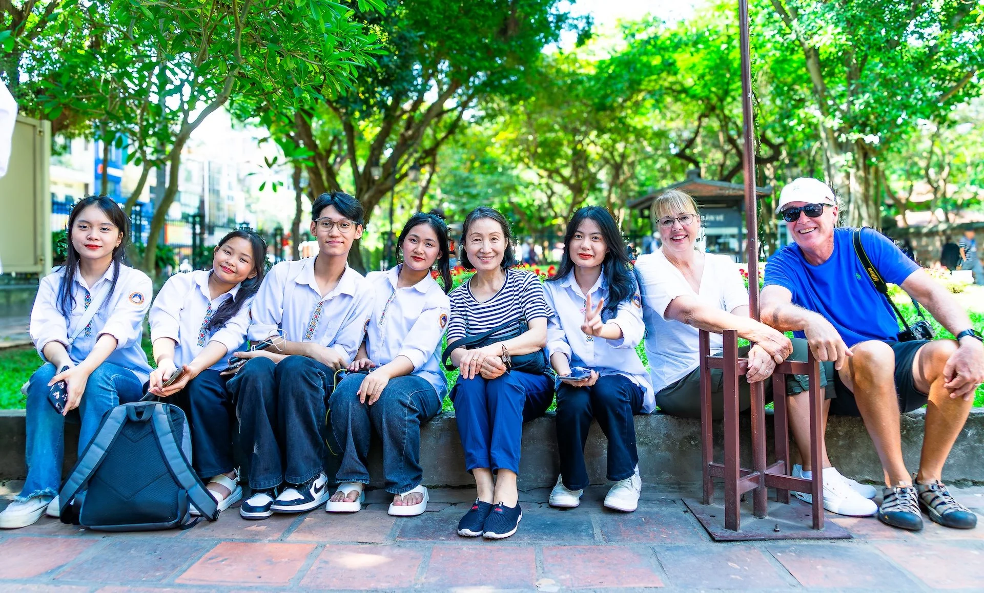 Vietnamese students with tourists