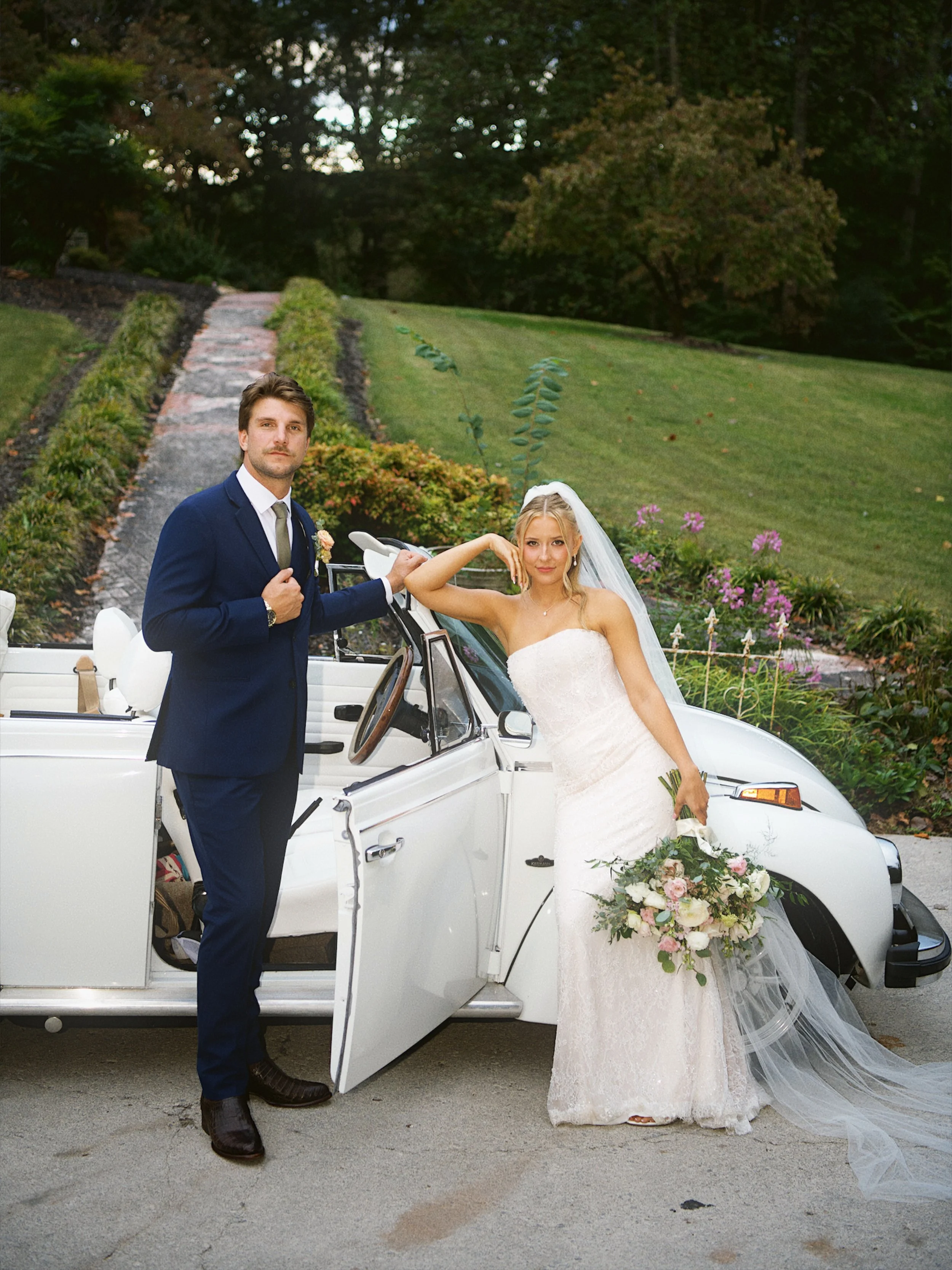 @sydsimmons_ &amp; @davis.simmons knew exactly what they were doing when they rented a vintage car for their wedding day!! WOW. These photos are everything and more!! Just a little sneak peek from the most incredible day, and trust us, there is SO mu