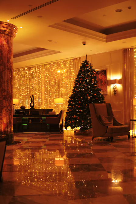 phos-holiday-inspiration-lobby-curtain-lights-tree.png