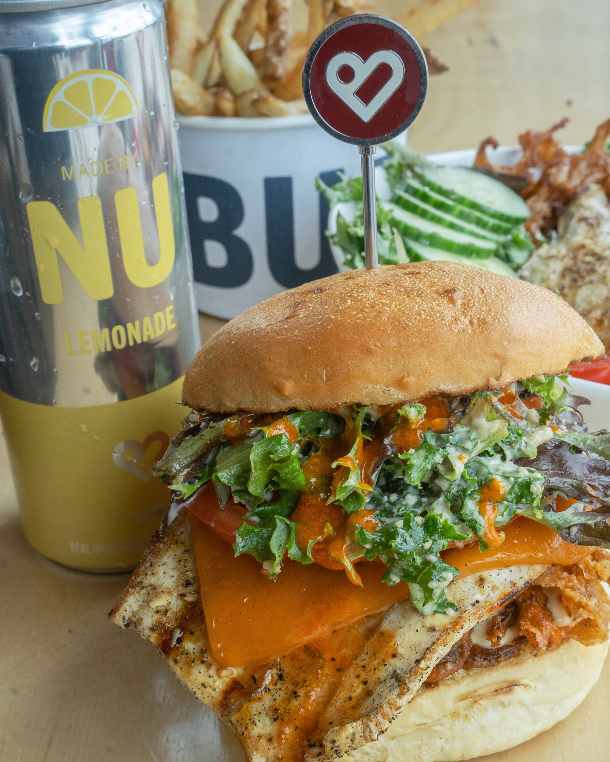Buffy 

Old cheddar, bacon bits, buffalo sauce, cajun onions, tomato, lettuce, caesar dressing on a baked fresh bun 

#buffaloburger #buffalosauce #lunch