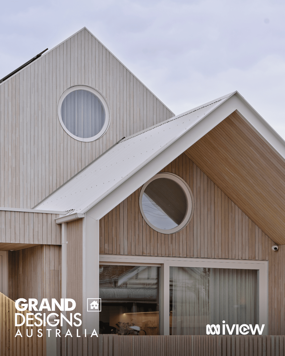 Front gable and circular window of Pigeon Passive House