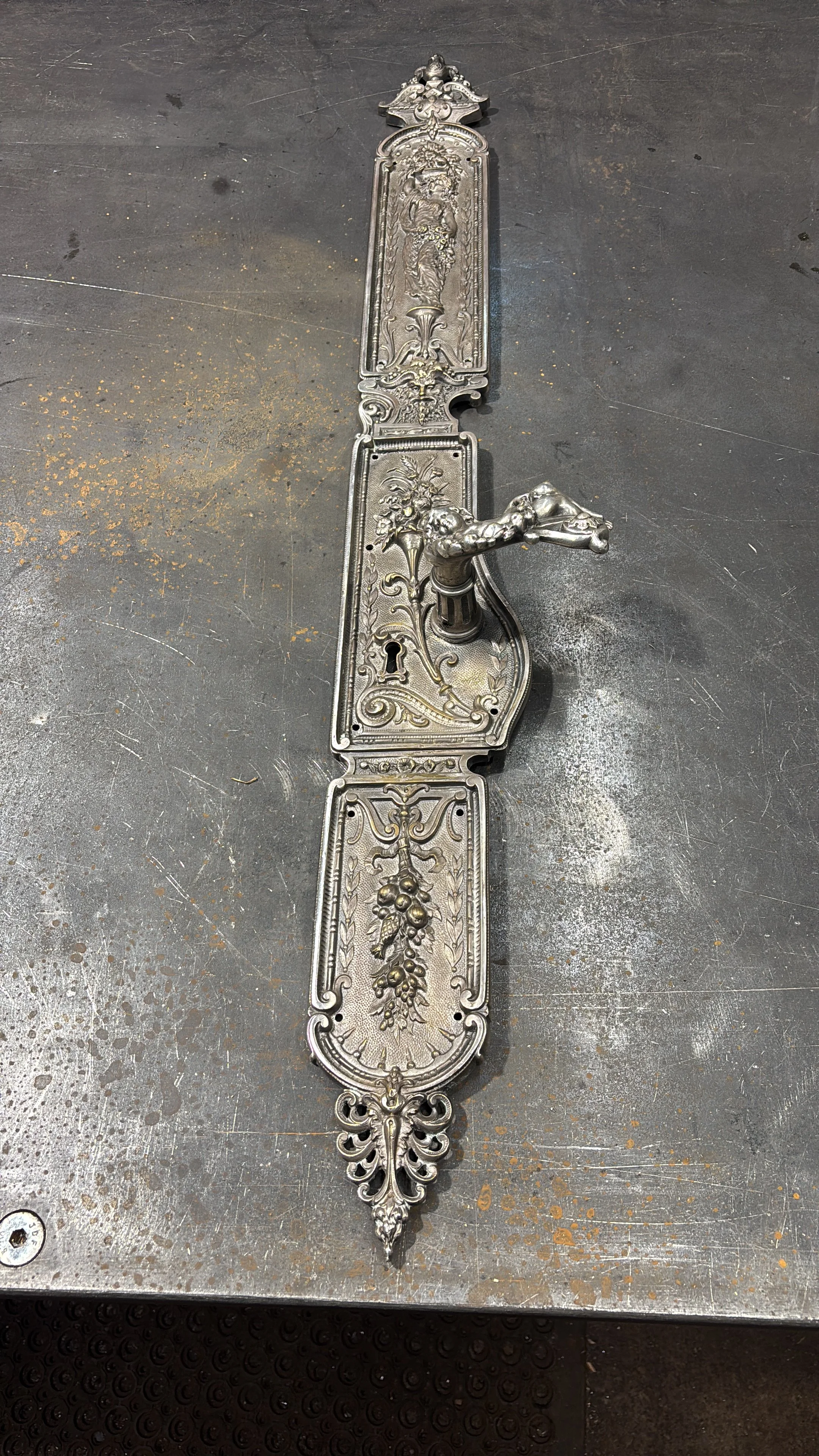 Ultra delicate repair to an 1853  heritage cast door pull from a local hotel