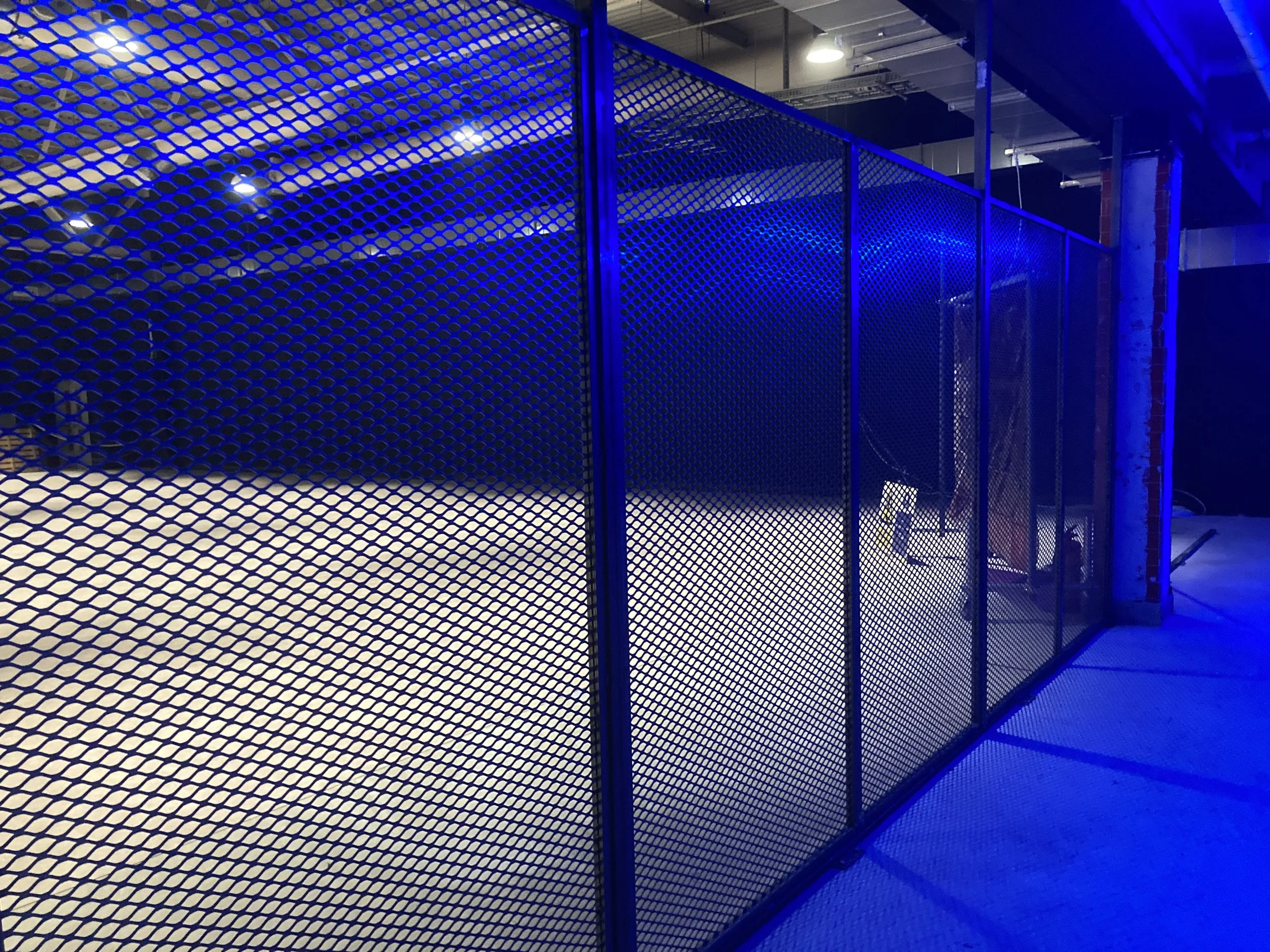 Custom steel mesh divider wall for a local Gym.