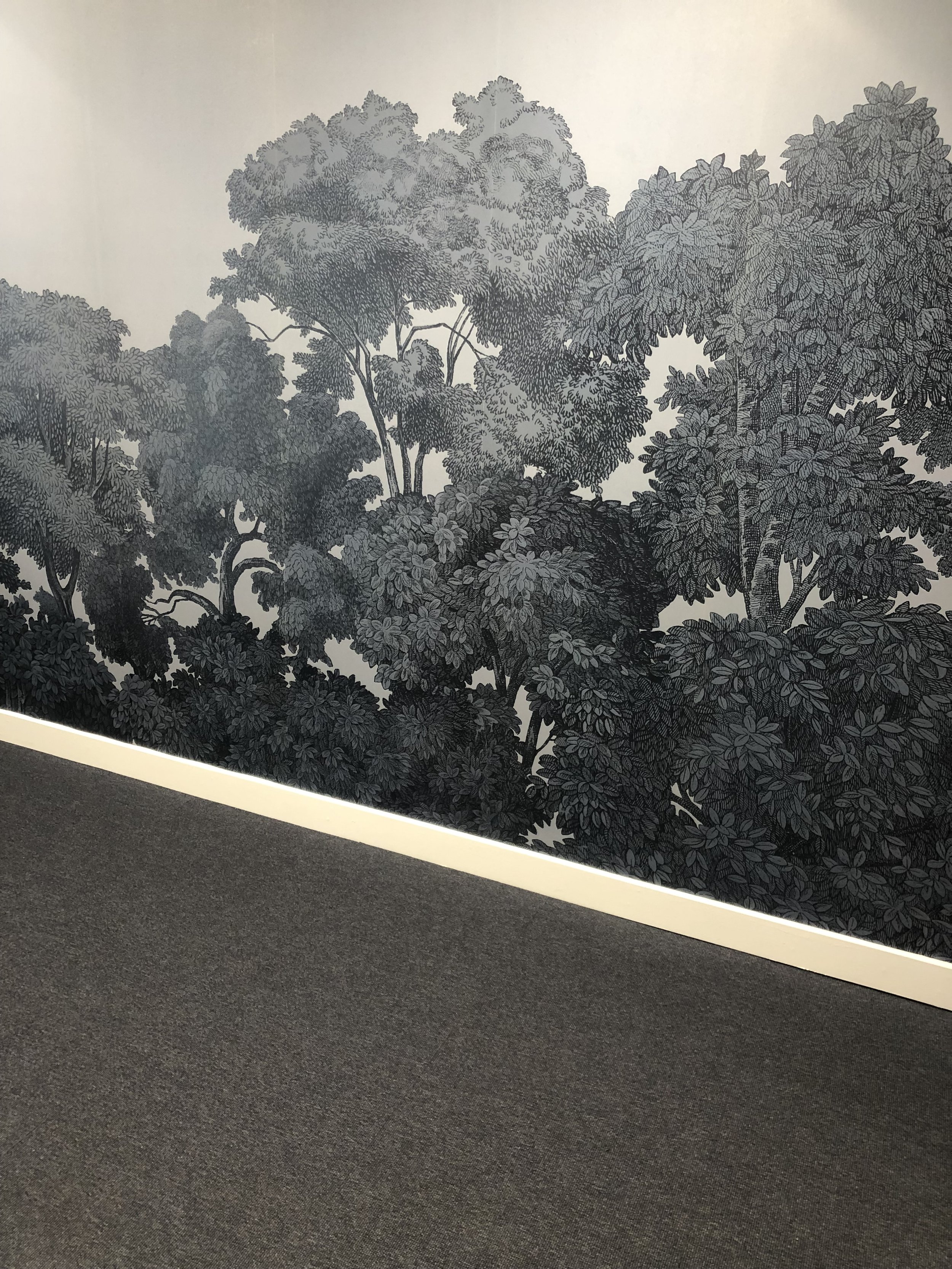 Blue practice room with forest wallcovering