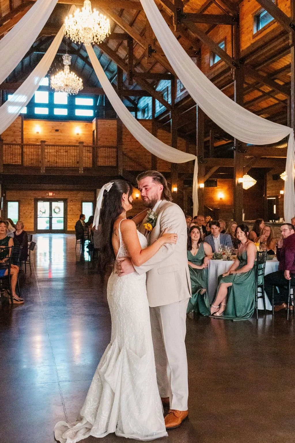 Elegant Cincinnati wedding venue featuring soft lighting and white draping