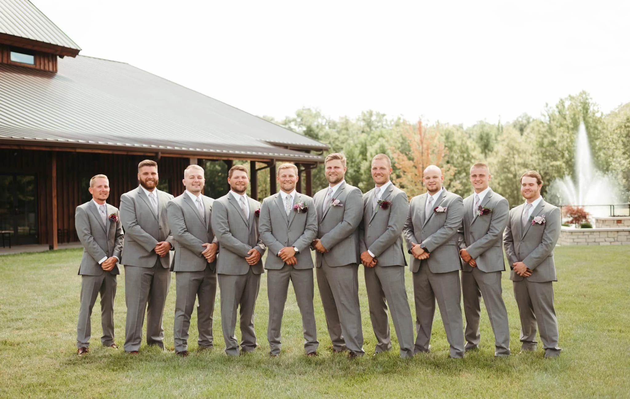 Groom and groomsmen look so stylish as the pose for wedding day photos at their wedding venue near Cincinnati