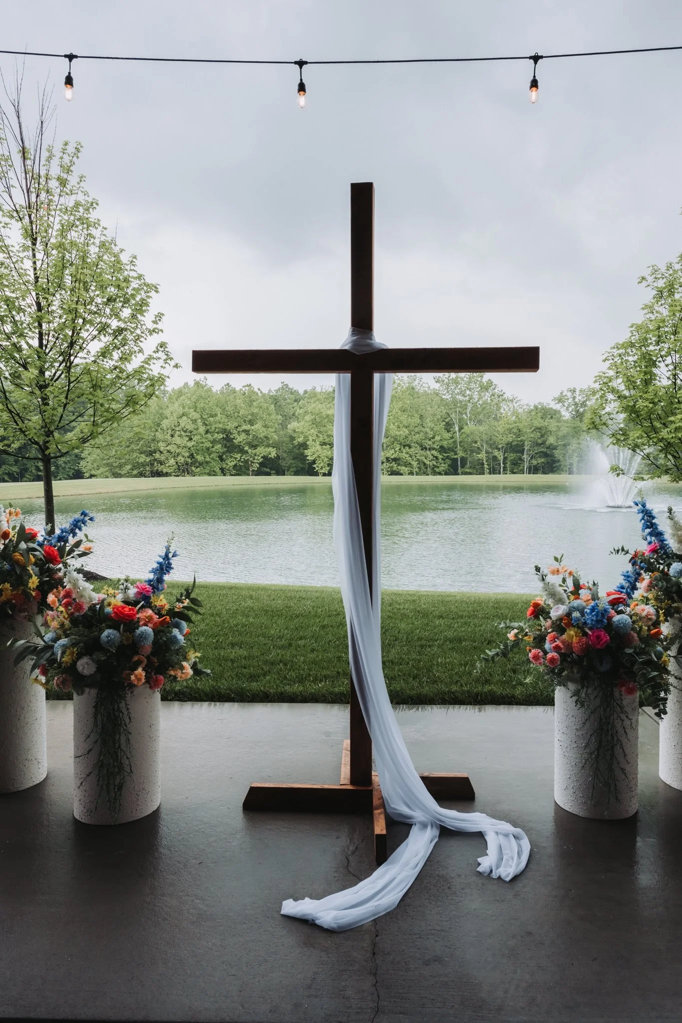 Christian wedding ceremony with water & fountain views near Cincinnati