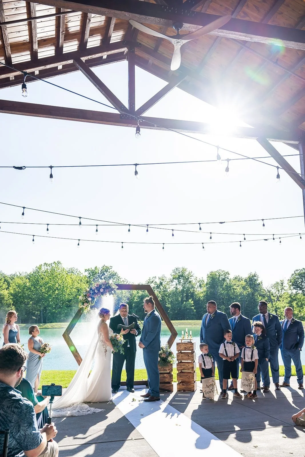 Outdoor wedding ceremony with pond, fountain, forests and 200 wedding guests enjoying the views.