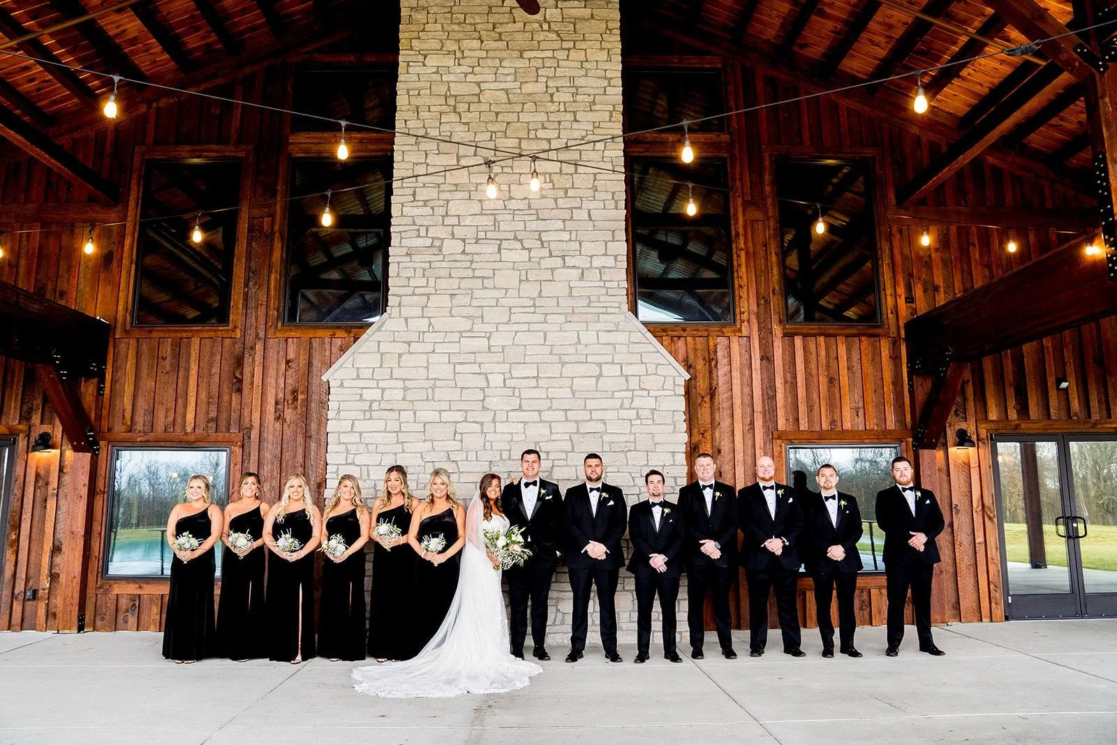 Wedding party wearing formal wedding dresses and suits at a Cincinnati wedding venue