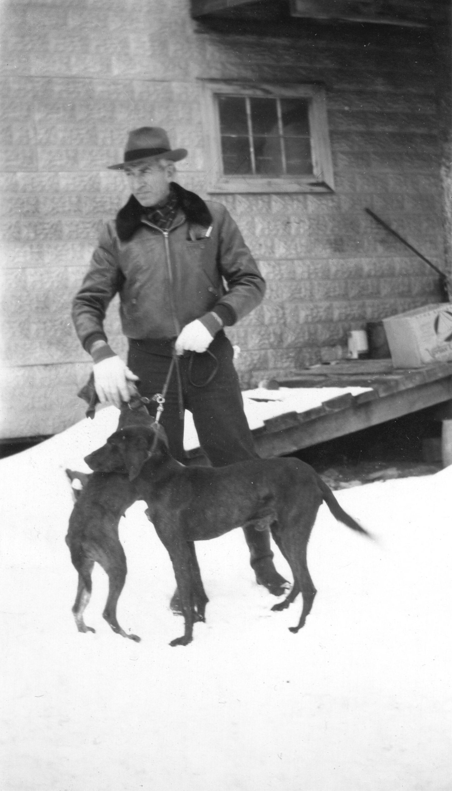  Louis Lundean with two dogs, n.d. Private Collection. 