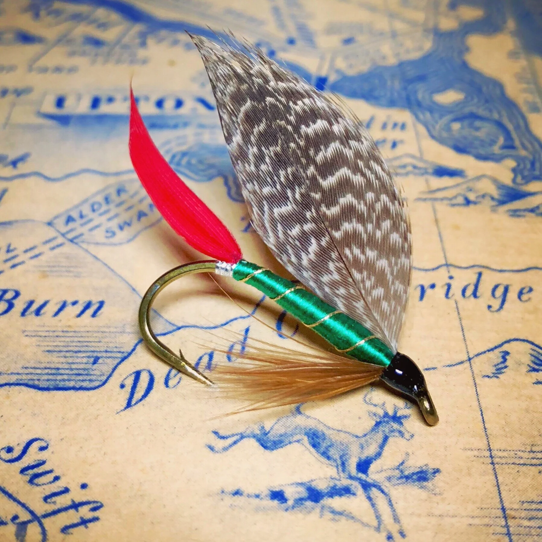 Image Credit: Grizzly King Ray Bergman Trout fly by Fred Klein.