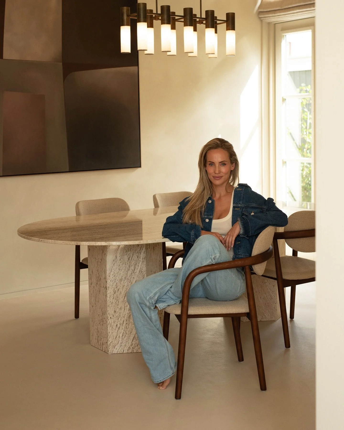 I'm always drawn to pieces that blend from a function beautifully. I love Gubi&rsquo;s massive travertin table in combination with the concrete finish of the walls and floor whereby the art of @atelier.juliehaverkamp just captures your attention.

Pi