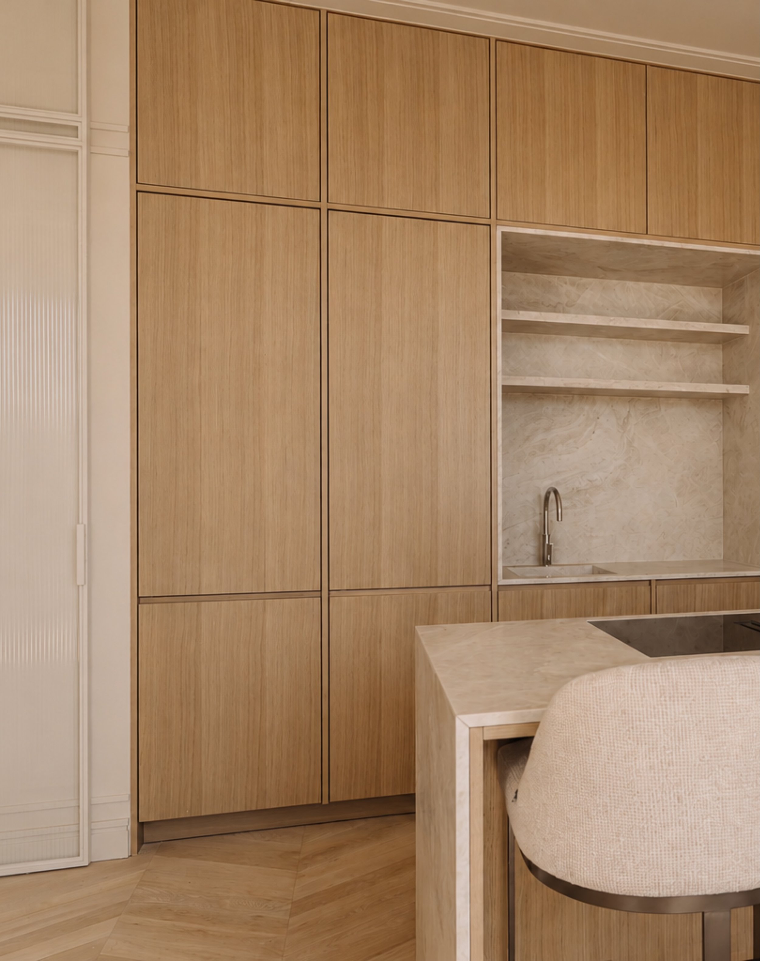 Project LS - We just love to design interiors that feel timeless.. and this kitchen is a good example of that. Light oak, taj mahal quartzite, fluted glass steel doors, we have thought about every small detail. 

We love using taj mahal in our projec