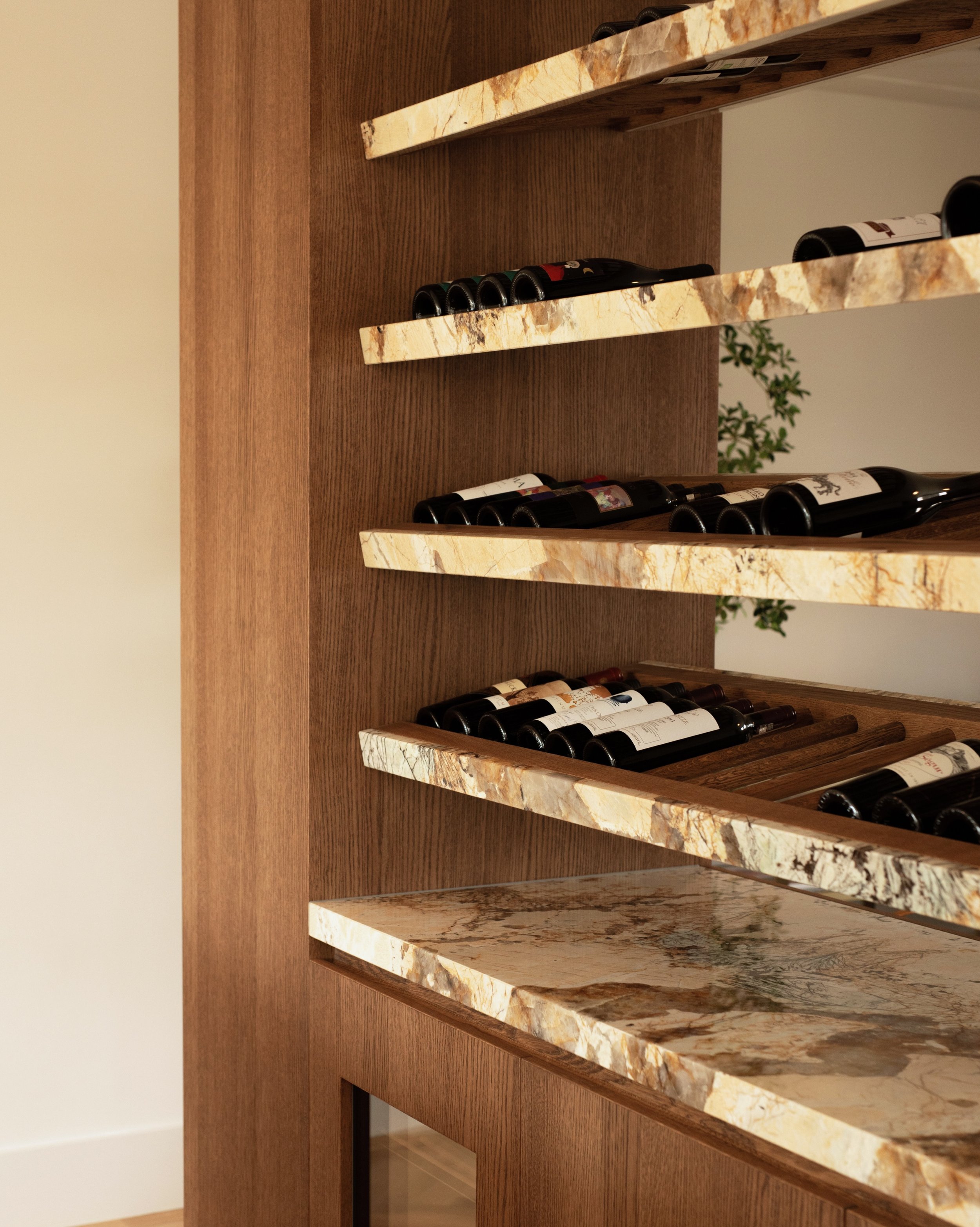 Project RV | Wine storage made for hosting. Designed in warm walnut wood, this custom cabinet is made for slow evenings, good conversations and hosting family and friends.