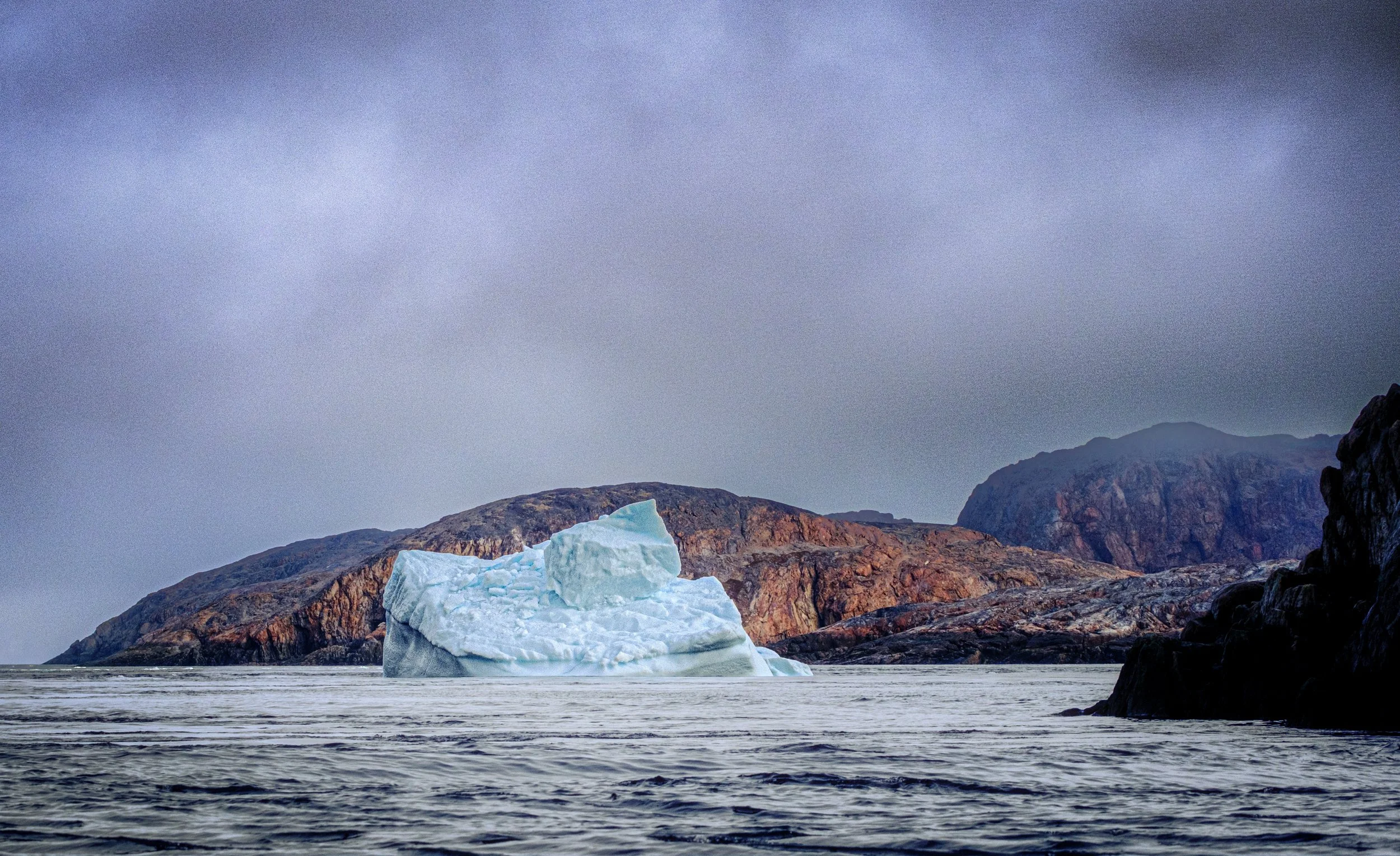 Flew to Iqaluit and overnighted by ship to the Lower Savage Islands, Nunavut. Polar bears looking for food frequent this location in late summer.