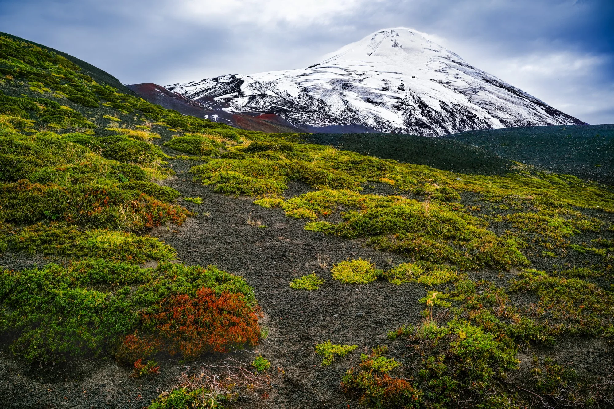 Osorno volcano, near Puerto Montt, Chile.  You can seeing the hiking/walking trail going towards the volcano.