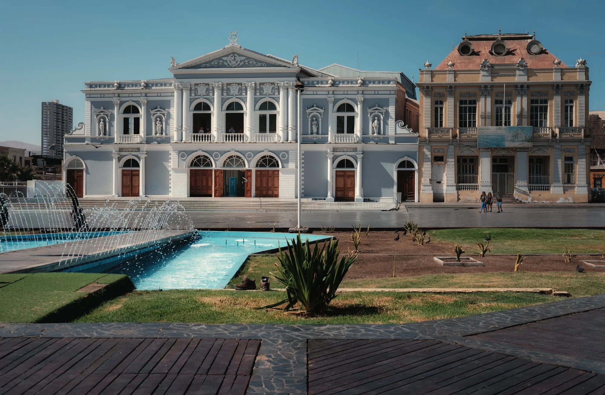 Iquique, Chile.  An unexpected city on coastal Chile.  Beautiful beach areas with hotels and apartments like Miami Beach, plus a redeveloped historic district featuring buildings such as this municipal theater. 