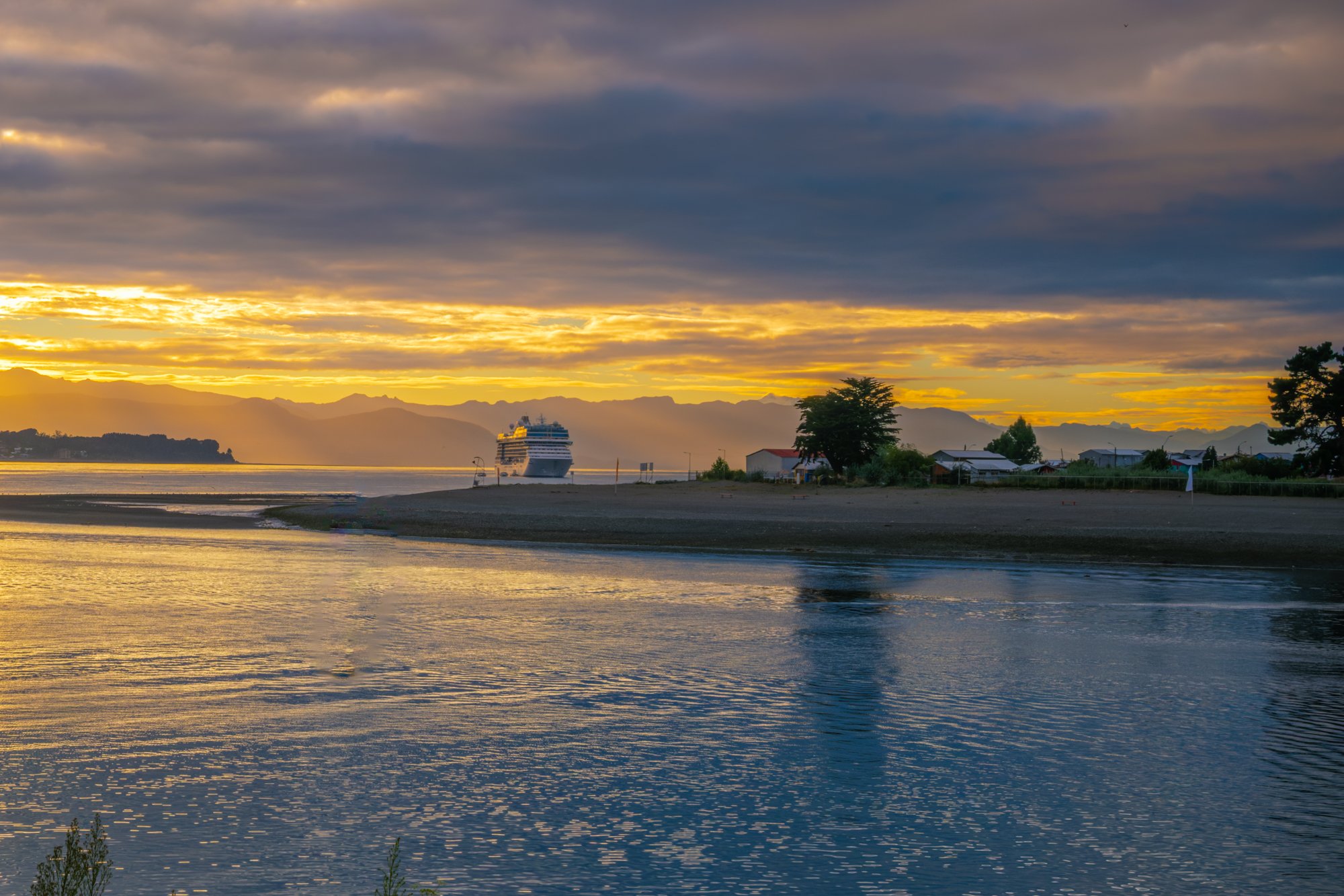 Sunrise over our ship, Puerto Montt, Chile. Puerto Montt, founded by German immigrants, is the gateway to the Lake and Volcano Districts of Chile.  