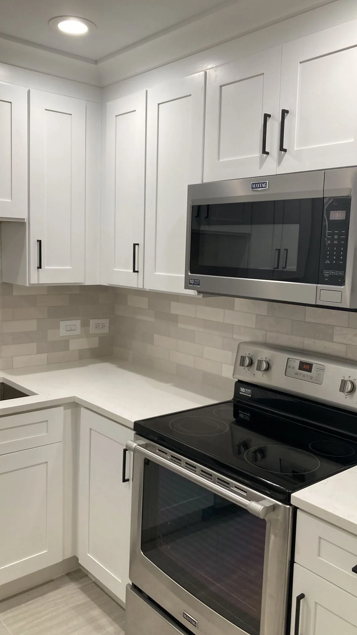kitchen remodel, cabinet remodel, cabinet installation, kitchen renovation, remodeling service, neutral kitchen, neutral backsplash, interior design services, realtors, shaker cabinets, black matte hardware, countertop installation, custom countertop